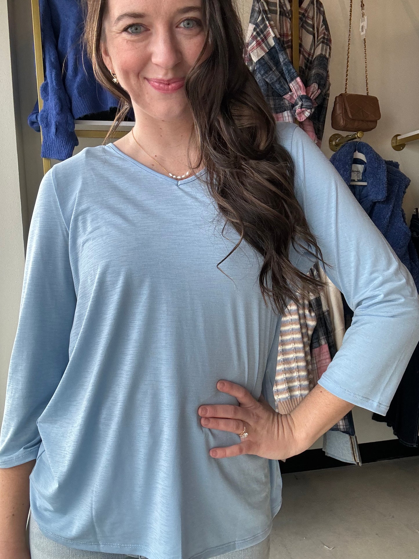 Dear Scarlett
Our signature classic v-neck poly bled top with 3/4" sleeve is a basic wrinkle-free top you want in your closet! Stretchy, non sheer, relaxed.