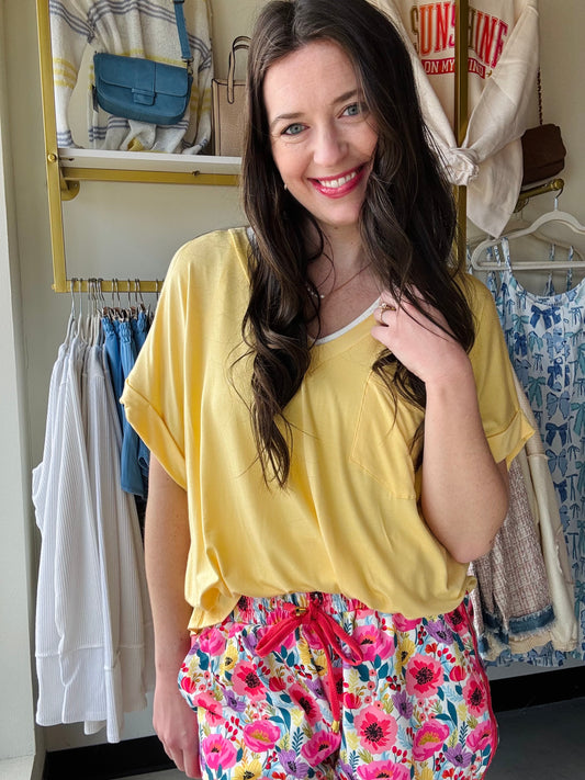 Upgrade your wardrobe with our Sierra Pocket Tops! Designed with a relaxed boyfriend fit, these tops are both comfortable and stylish. The cuff sleeves add a touch of sophistication to complete your look. Pair it with jeans or dress it up with black pants and a blazer.