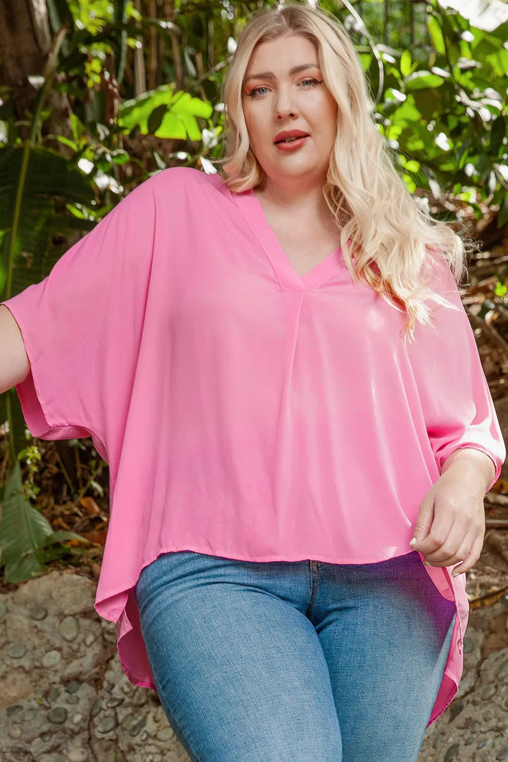 This stylish blouse comes with a flattering v-neckline and a relaxed shift silhouette. The half sleeve and high-low hem add a unique touch, while the loose-fitting design ensures all-day comfort. Perfect for ladies who value style and comfort!