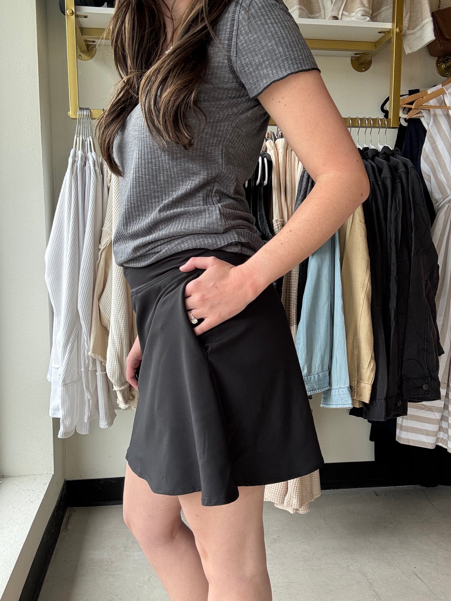 Made for moving through your day and looking cute without even trying, this classic skort features a double-layered skirt over stretchy shorts with an elastic waistband and dual side pockets.