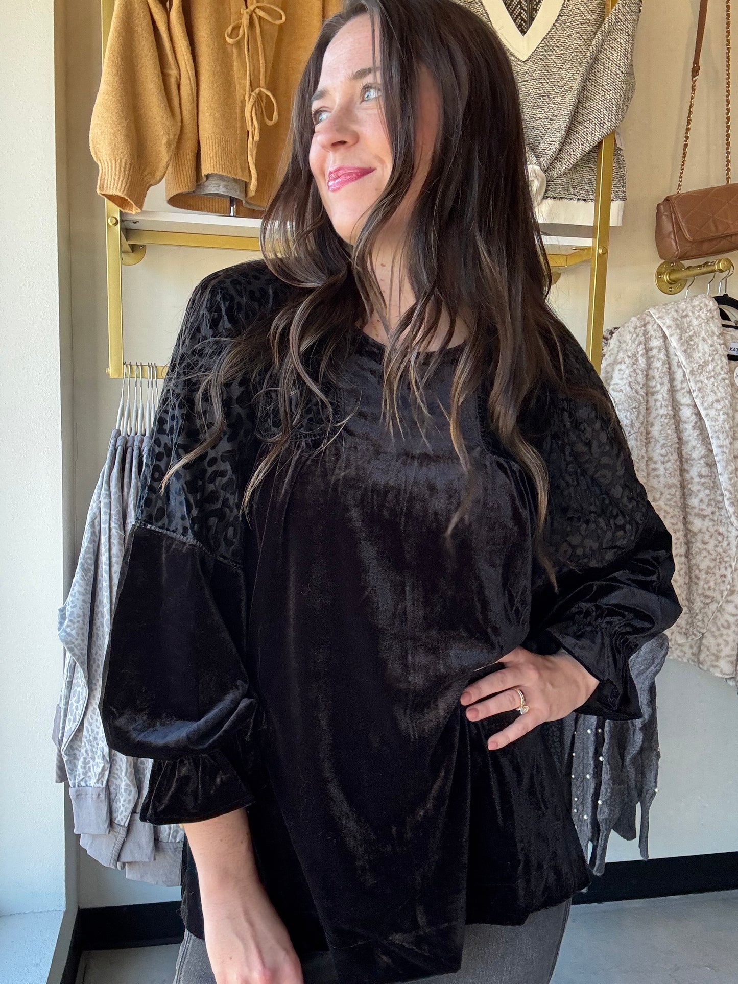 Umgee
Elevate your style with this playful black velvet burnout top, featuring a stunning animal velvet pattern and delicate ladder trim detail. Its soft texture and unique design add a fun twist to any outfit, perfect for those who love mixing comfort with a hint of wild flair.