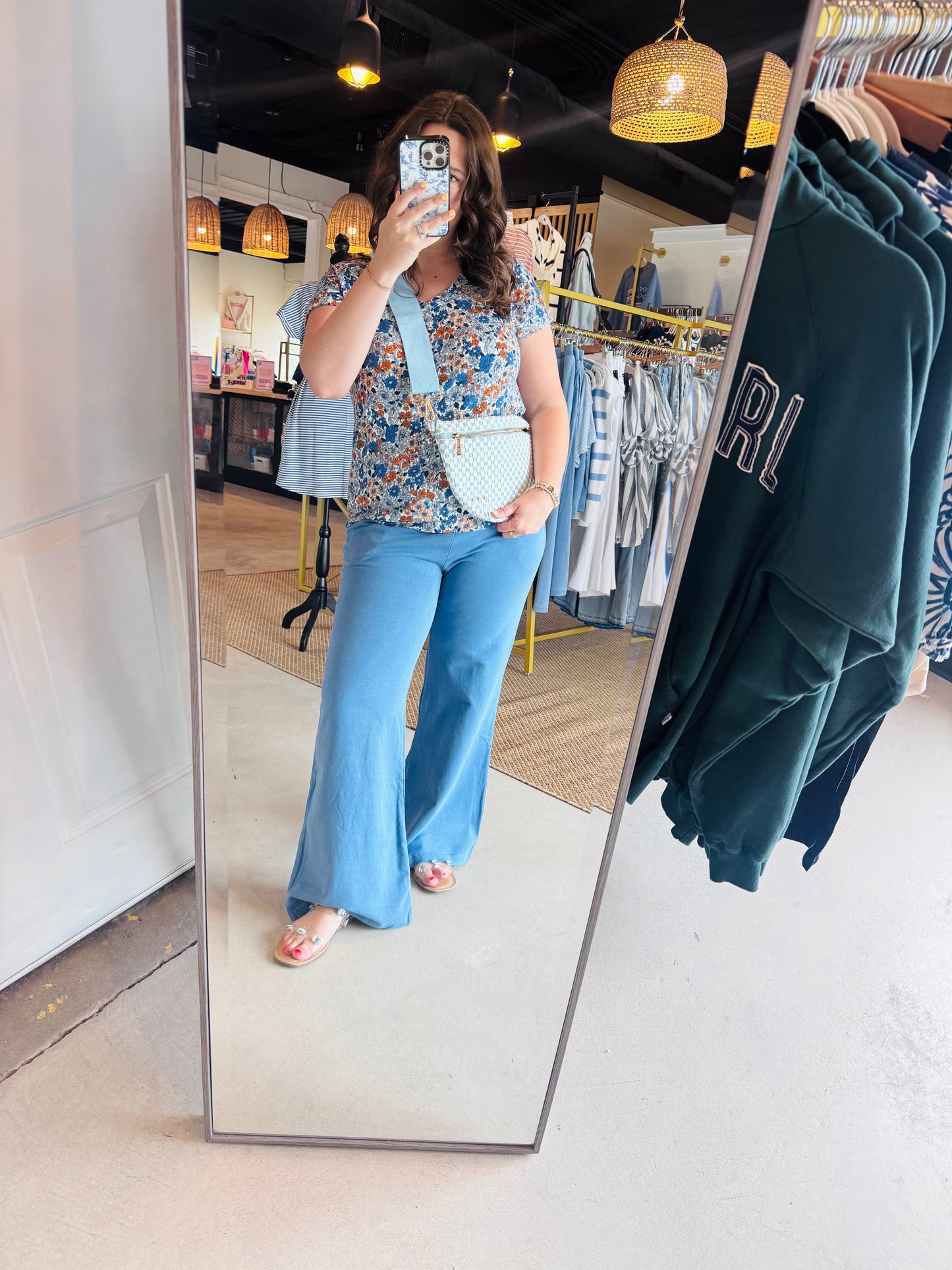 Experience the perfect fusion of lounge-level comfort and street-ready chic. These buttery-soft knit flares feature a slimming high-waist silhouette and functional side pockets for effortless, all-day versatility.