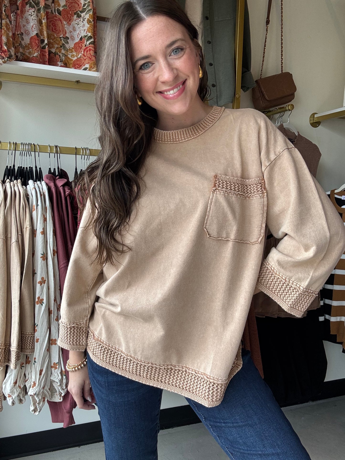 Easel
This Mocha Knit Pocket Crewneck features 3/4 length sleeves and a classic crew neckline for a refined, comfortable fit. The subtle braid detailing adds texture and visual interest, making it a sophisticated choice for fall layering. Perfect for transitioning seasons, this sweatshirt combines effortless style with cozy warmth.