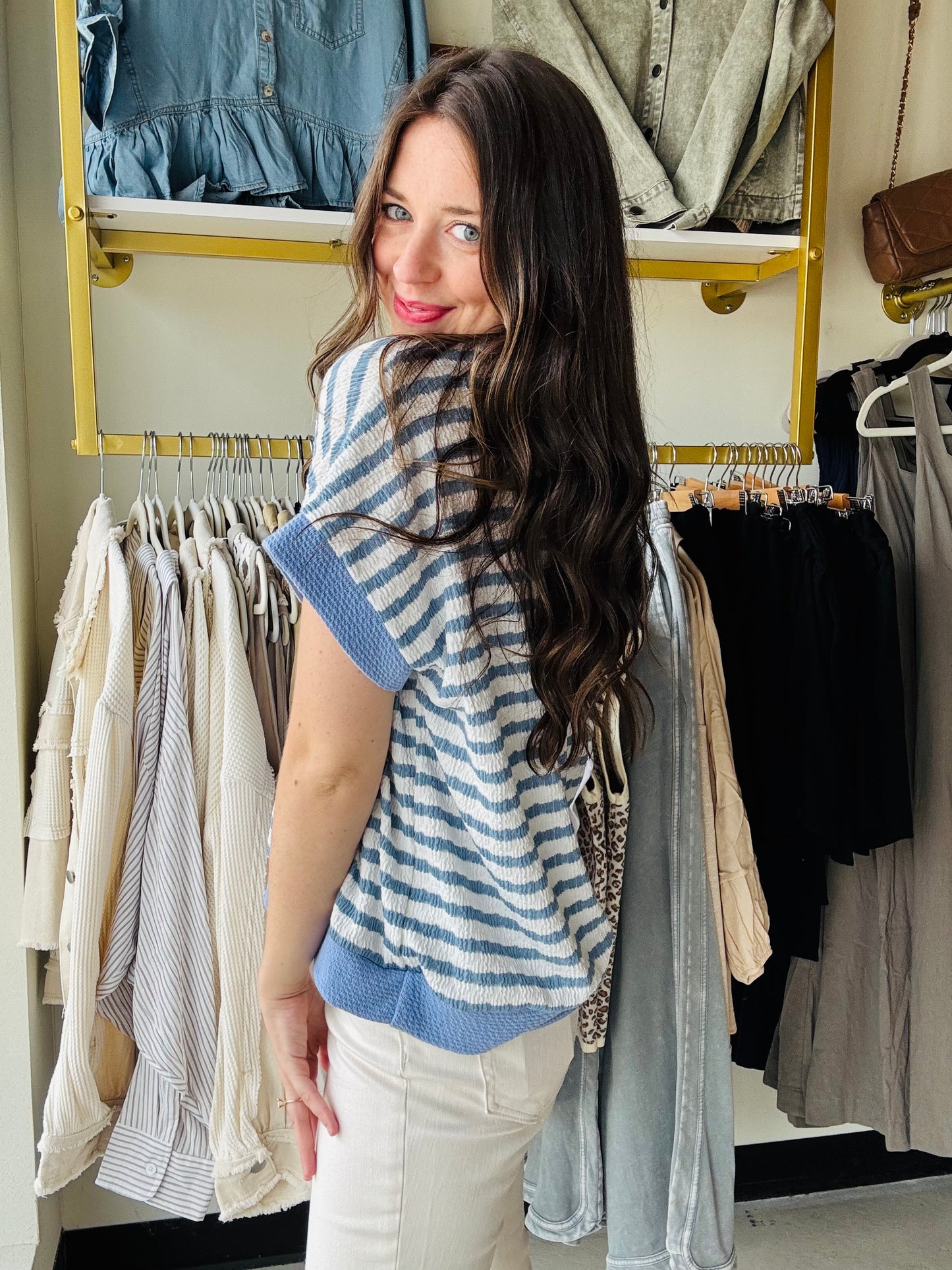 Lovely Melody
Made in USA
Our Heart to Heart Chambray Top combines cozy poly rayon span fabric with playful striped design. It features fun solid contrast banded drop shoulder short sleeves and a matching solid contrast band V-neckline, adding a flirty twist to your casual look. Perfect for days when you want comfort with a splash of charm!