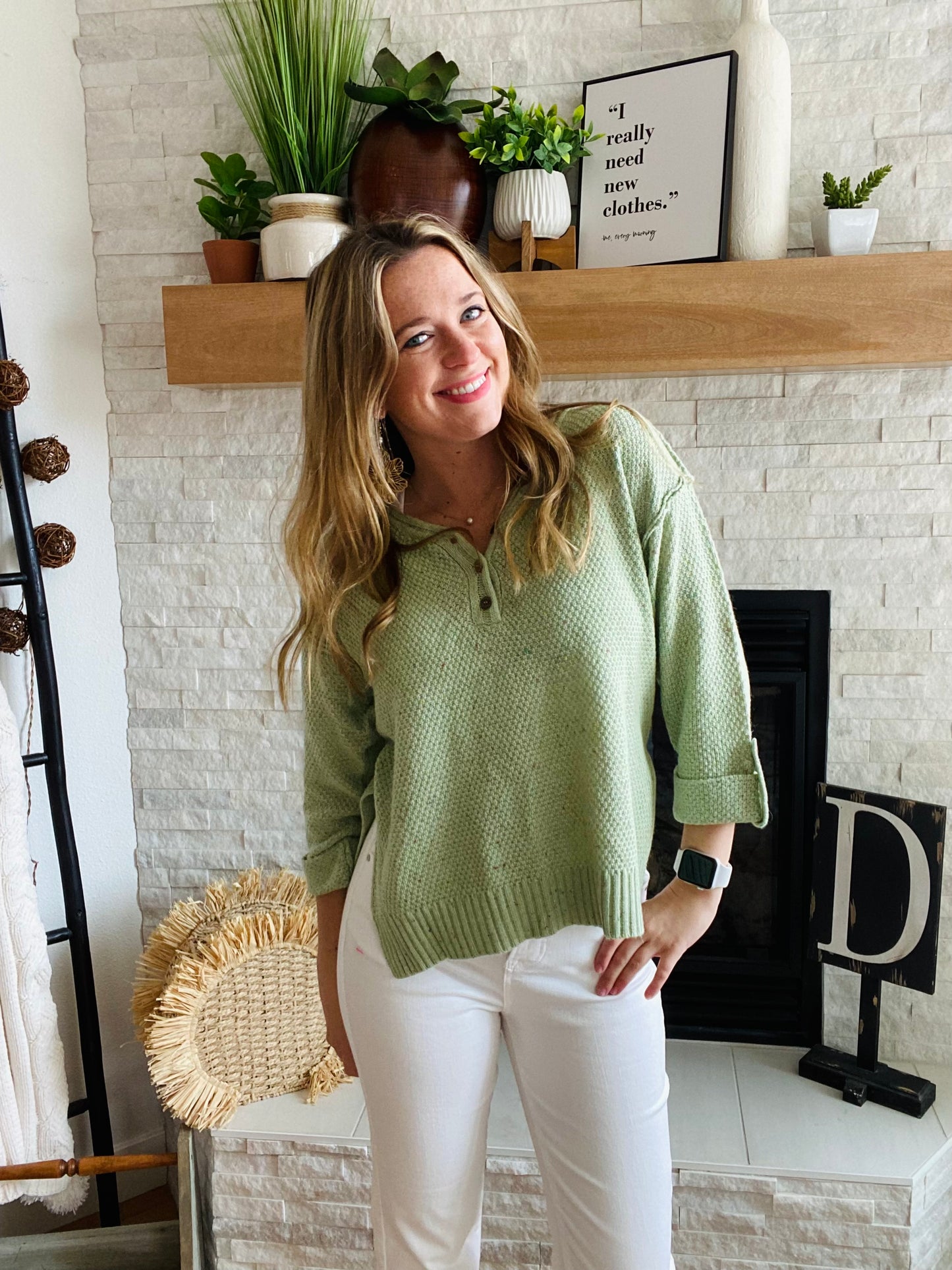 Our Green Button Confetti Sweater is the perfect statement piece this season. It features striking flecks of color in the fabric, a rolled up sleeve with button detailing, and a slightly oversized fit. With a versatile design, this sweater pairs easily with white denim for a unique, stylistic look.