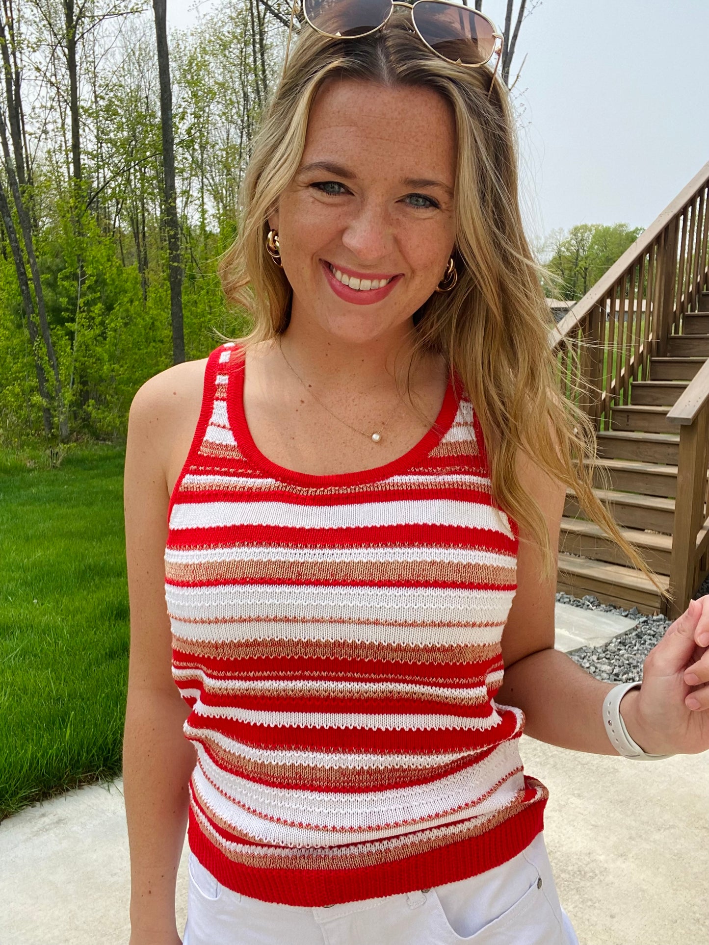 This Bomb Pop Red Scoop Neck Striped Tank is perfect for any time of year. Crafted from cozy sweater knit material, the wide straps and flirty fit pair perfectly with white and blue denim for a classic look. Enjoy a festive and fun style this season.