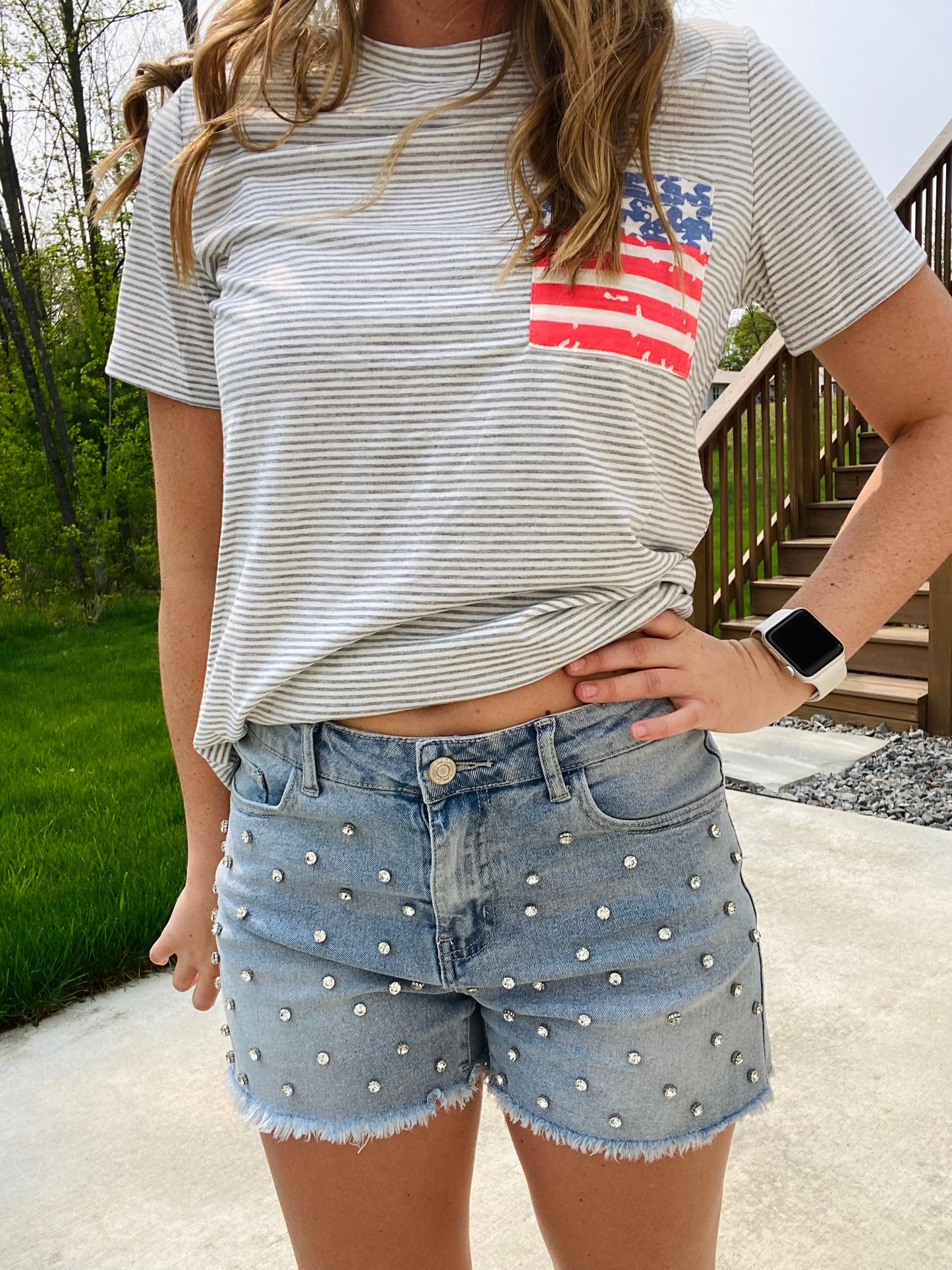Turn heads in this sparkling denim shorts! The perfect piece to fulfill all of your rhinestone dreams! Wear them to your next concert, day out, or date night! The Reese features a mid rise fit, a frayed hem, and rhinestone studs. Hand Wash preferred