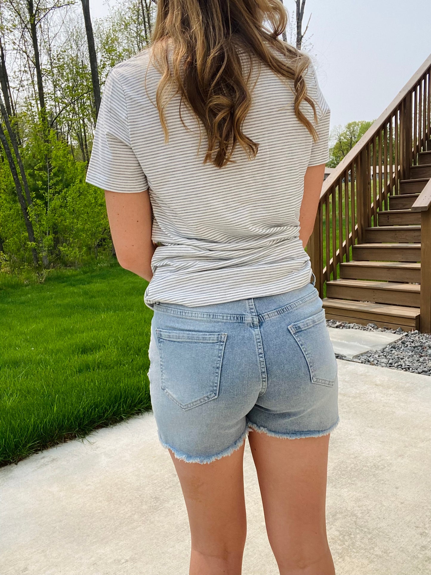 Turn heads in this sparkling denim shorts! The perfect piece to fulfill all of your rhinestone dreams! Wear them to your next concert, day out, or date night! The Reese features a mid rise fit, a frayed hem, and rhinestone studs. Hand Wash preferred