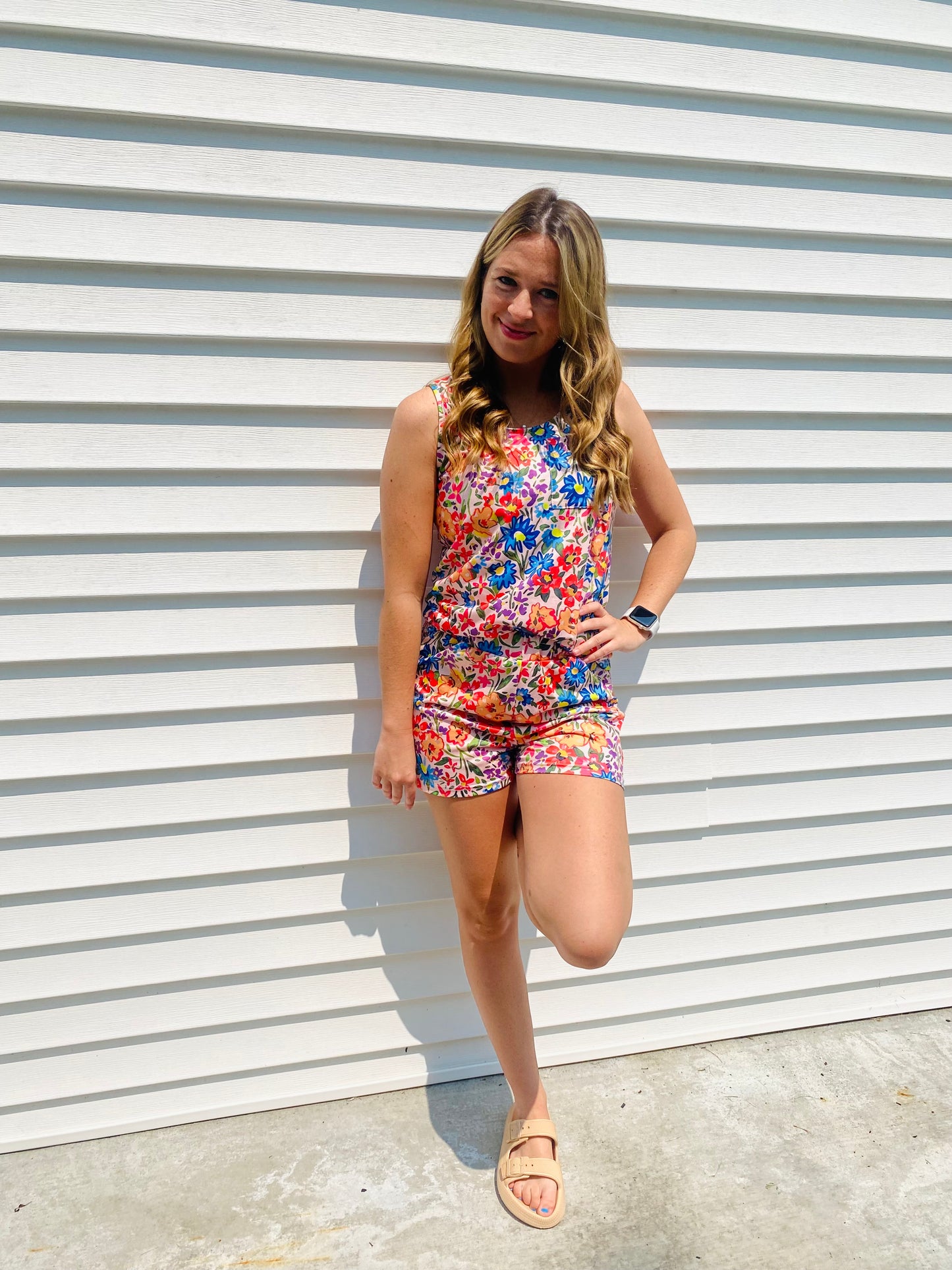 Stay stylish and comfortable all summer in the Vibrant Garden Floral Lounge Set. This set features a scoop neck tank top and drawstring comfy shorts in bright colors - perfect for lounging around going out and about.. Shhh we won't tell! The lightweight fabric keeps you cool in the heat, while the stylish design ensures you look great even at home!