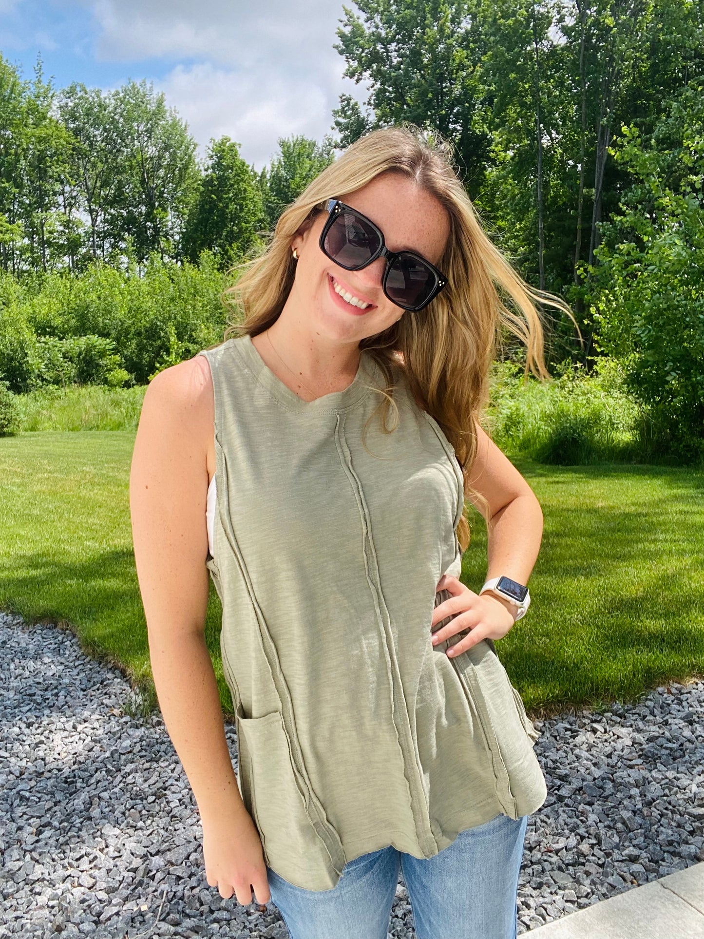 This Olive Exposed Seam Tank Top is the perfect pick for a stylish-yet-casual look. Featuring multi-seam detailing, raw edge neck and hem finishing, and side front pockets, this tank top will be your go-to for effortless, everyday style. The round neck ensures a classic look. Branded: Very J