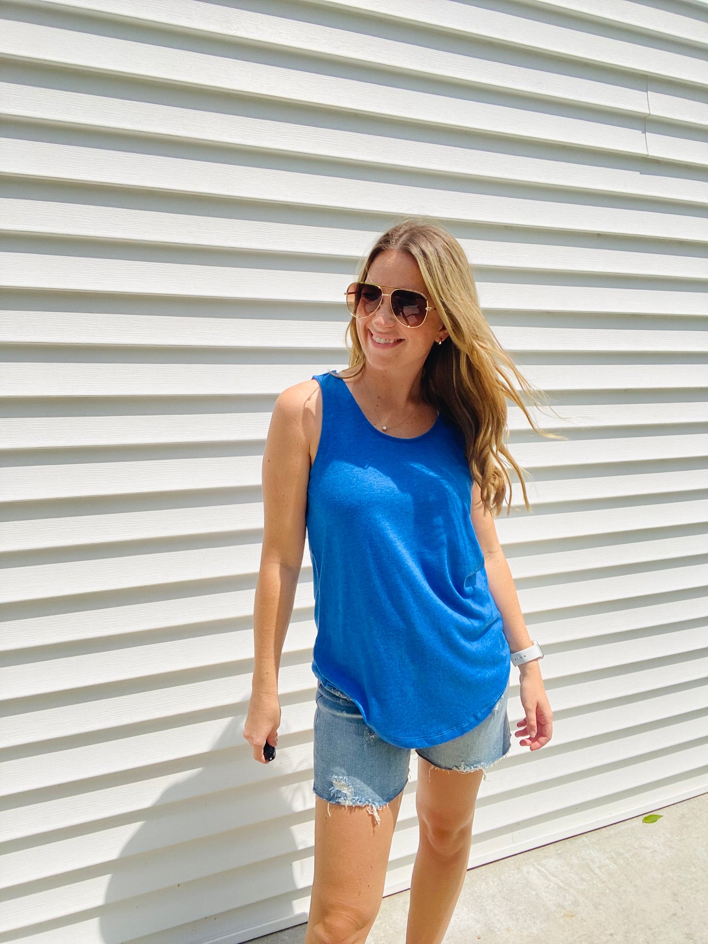 The Tiffany Tank is the perfect combination of comfy and trendy. Crafted with a stretchy fabric for ultimate comfort, this tank features a scoop neck and wide straps to ensure a secure fit and bold neon colors to make a statement. Feel fashionable and secure with this essential tank.