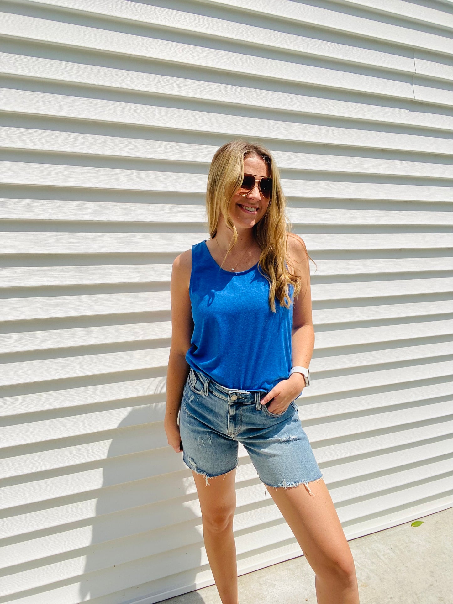 The Tiffany Tank is the perfect combination of comfy and trendy. Crafted with a stretchy fabric for ultimate comfort, this tank features a scoop neck and wide straps to ensure a secure fit and bold neon colors to make a statement. Feel fashionable and secure with this essential tank.