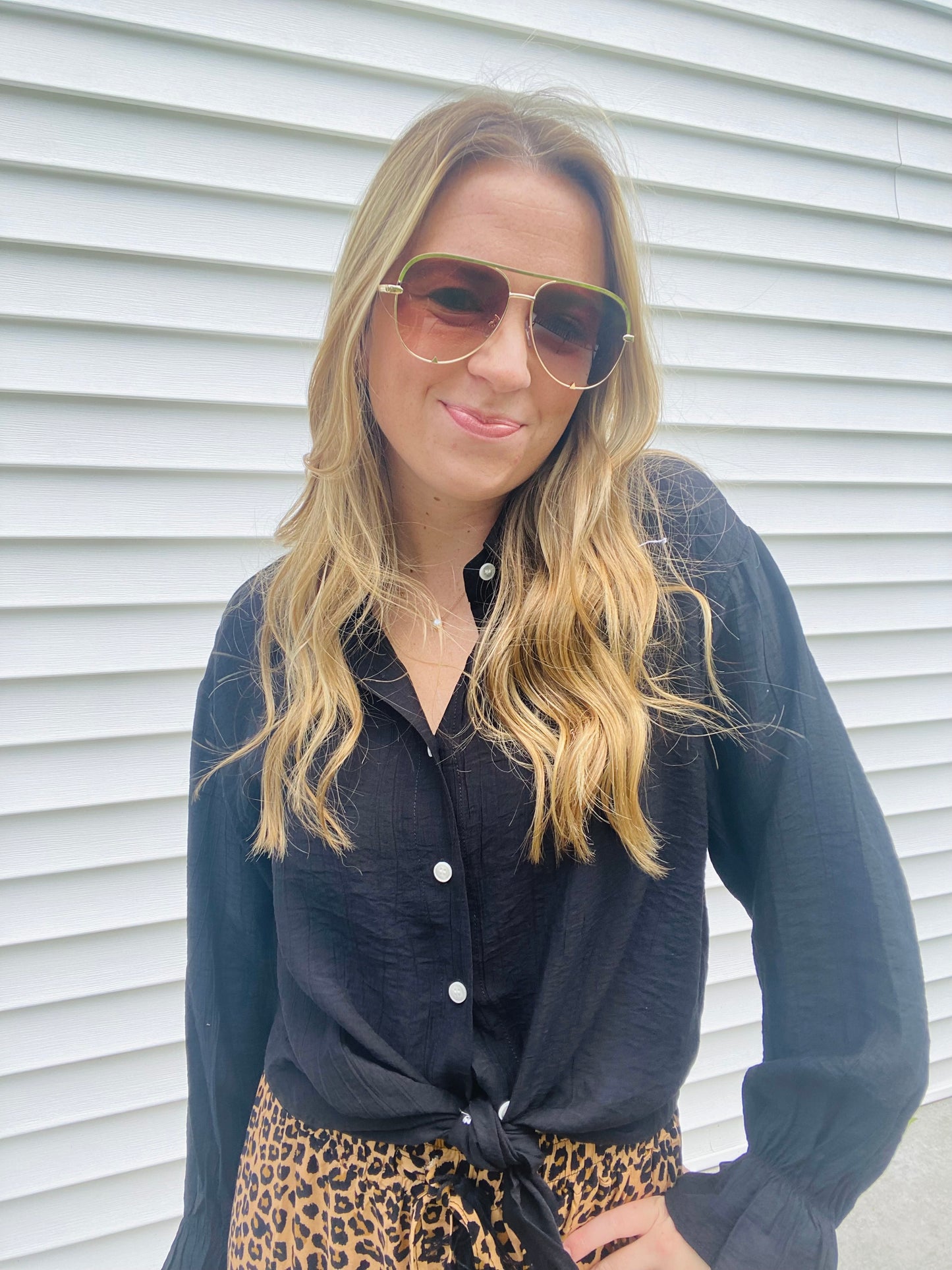 This Gauzy Bell Sleeve Blouse is crafted from lightweight polyester and spandex for an ultra-airy feel and relaxed fit. This blouse features baby bell sleeves and a collar, with functional buttons to ensure a perfect fit. The gauze fabric has a mild sheerness for an elegant look.