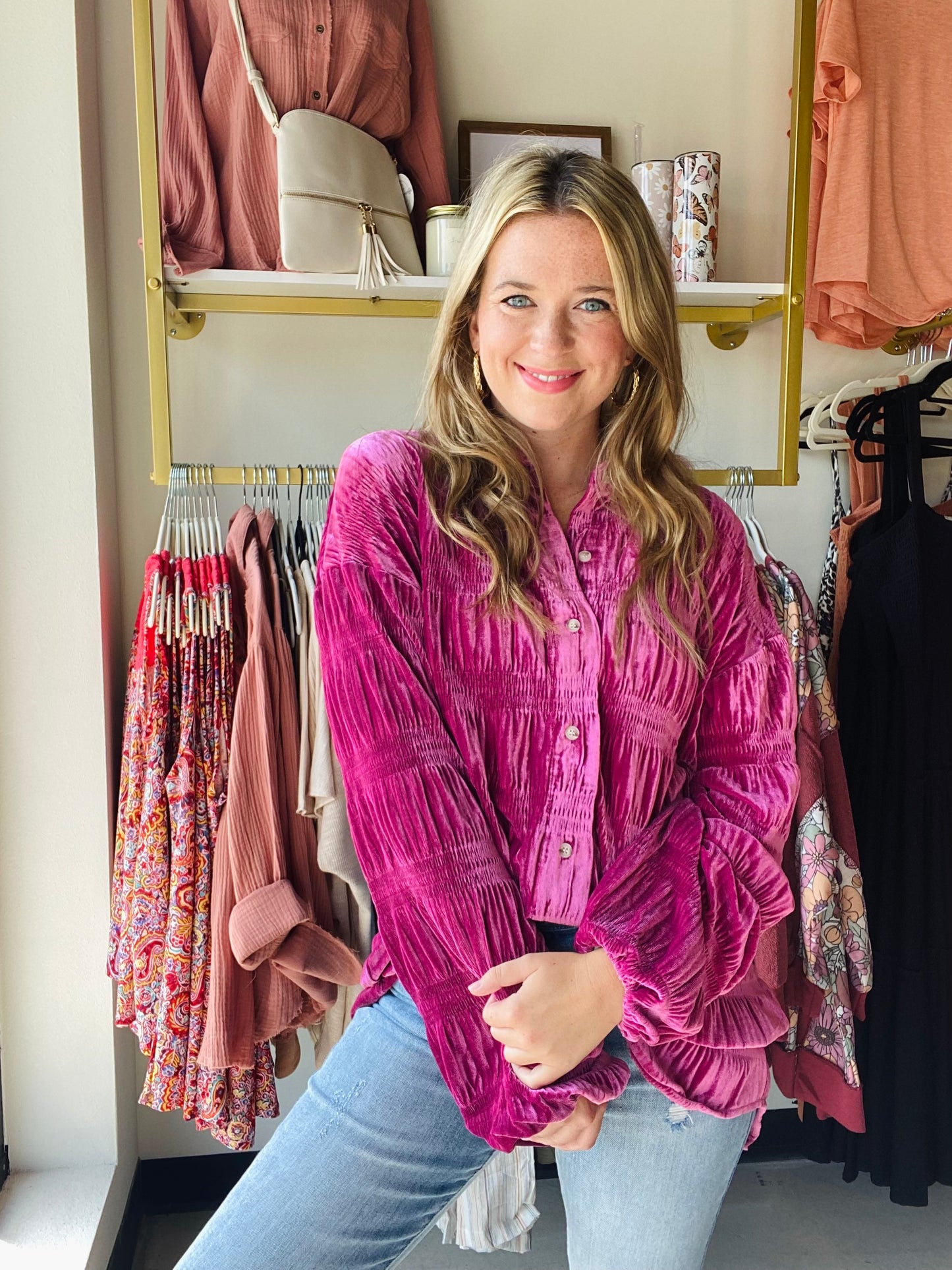 This Hibiscus Tiered Velvet Top offers a bold jewel tone, perfect for transitioning to fall and winter. The oversized yet trendy silhouette features super soft fabric and balloon sleeves for a modern look. Elevate any outfit with this stylish top while still feeling comfortable.