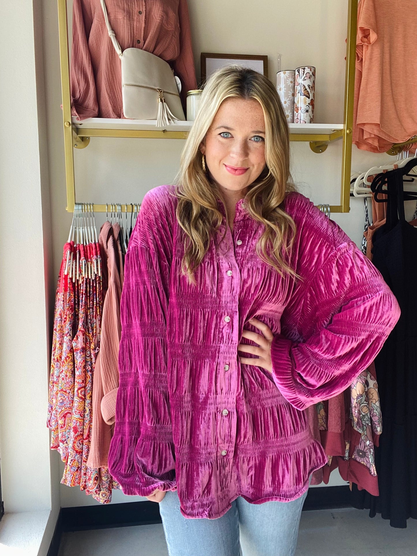This Hibiscus Tiered Velvet Top offers a bold jewel tone, perfect for transitioning to fall and winter. The oversized yet trendy silhouette features super soft fabric and balloon sleeves for a modern look. Elevate any outfit with this stylish top while still feeling comfortable.