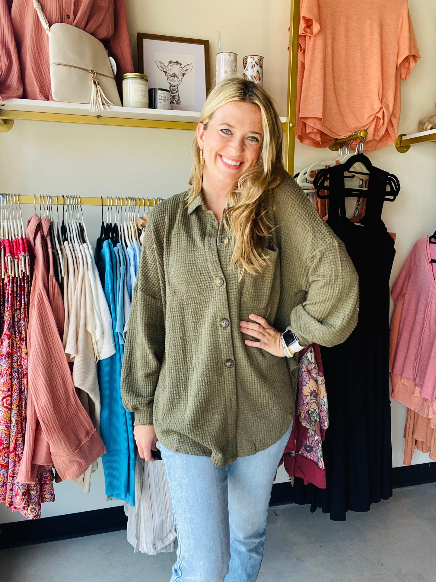 Introducing the Olive Waffle Knit Lightweight Shacket - perfect for easy, casual style. Crafted from lightweight material with waffle knit texturing and a dropped shoulder silhouette, this shacket is designed for comfort and breathability. Button up front, a collared neckline and a single accent chest pocket complete the look. Enjoy the relaxed, comfortable fit that ends in a rounded hemline.