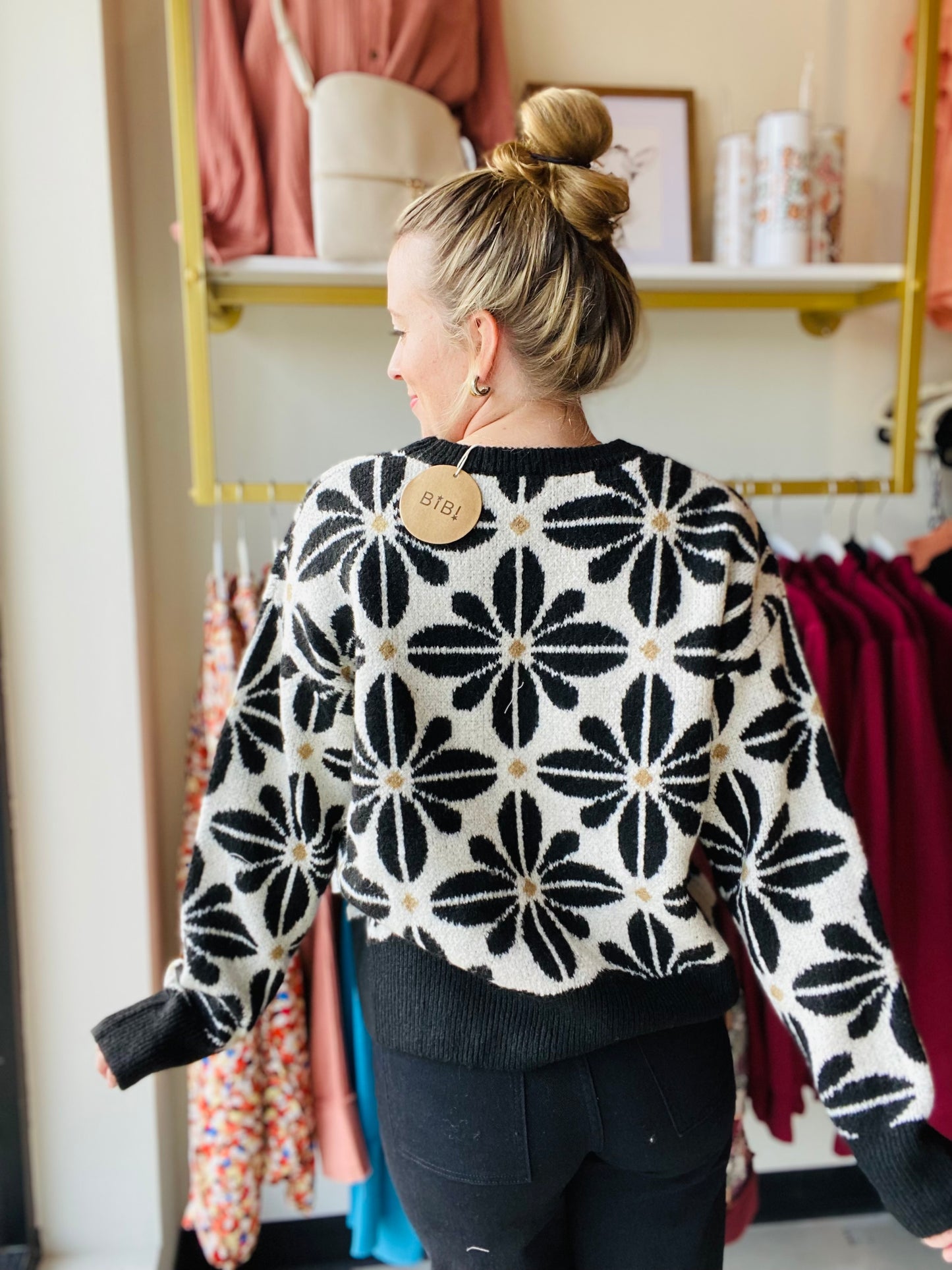 This Black and Ivory Pedal Sweater is the perfect addition to any fall wardrobe. Featuring a timeless design and a drop shoulder silhouette, this sweater embodies modern fashion trends while retaining classic style. Its effortless look pairs perfectly with denim, making it the ideal choice for any occasion. Bibi Brand