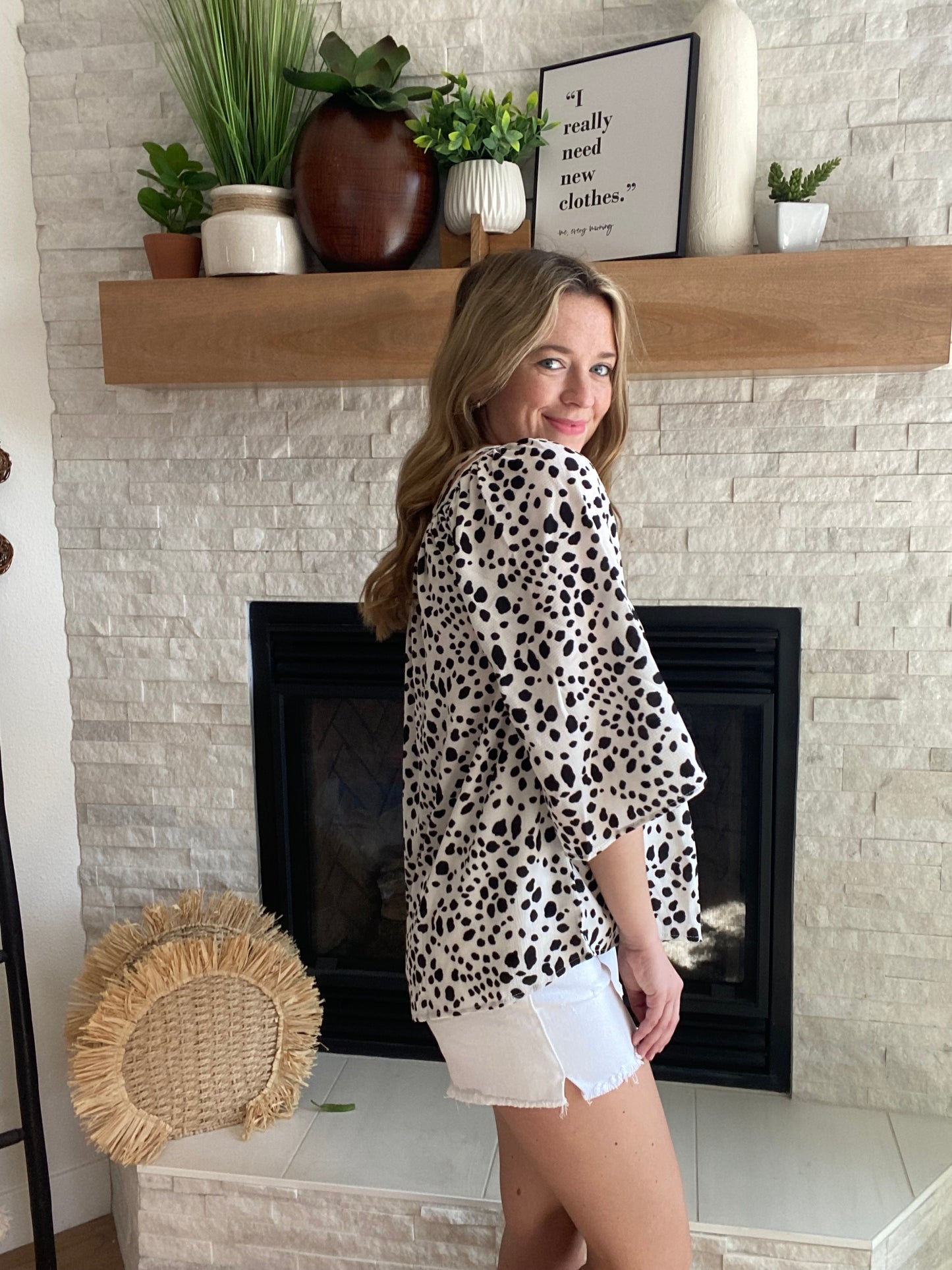 This gorgeous top is a perfect piece for your closet! You are sure to fall in love with this beauty! This top features a rounded neckline, cold shoulders, & a flowy style. You can throw on the adorable top with a pair of jeans or shorts and you're to go!