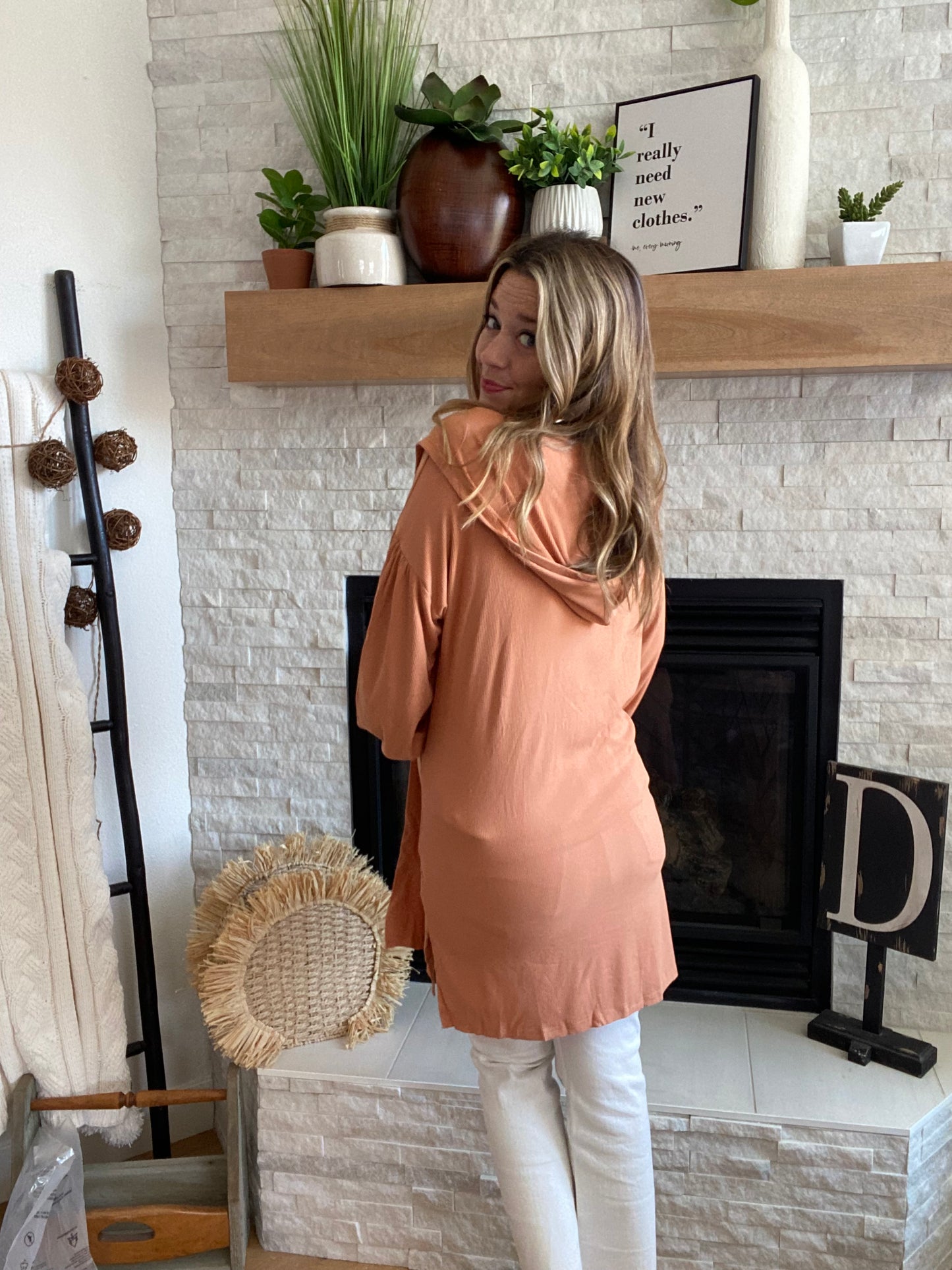 Stay cozy in style with the Khaki Side Slit Hooded Cardi! Made with a comfy stretchy fabric and a hood, it's the perfect go-to piece to keep yourself feeling relaxed and looking cool. The balloon sleeve accent adds a unique touch, while the side slit makes it oh-so-easy to throw on and wear all day. Stay warm, stay chic!