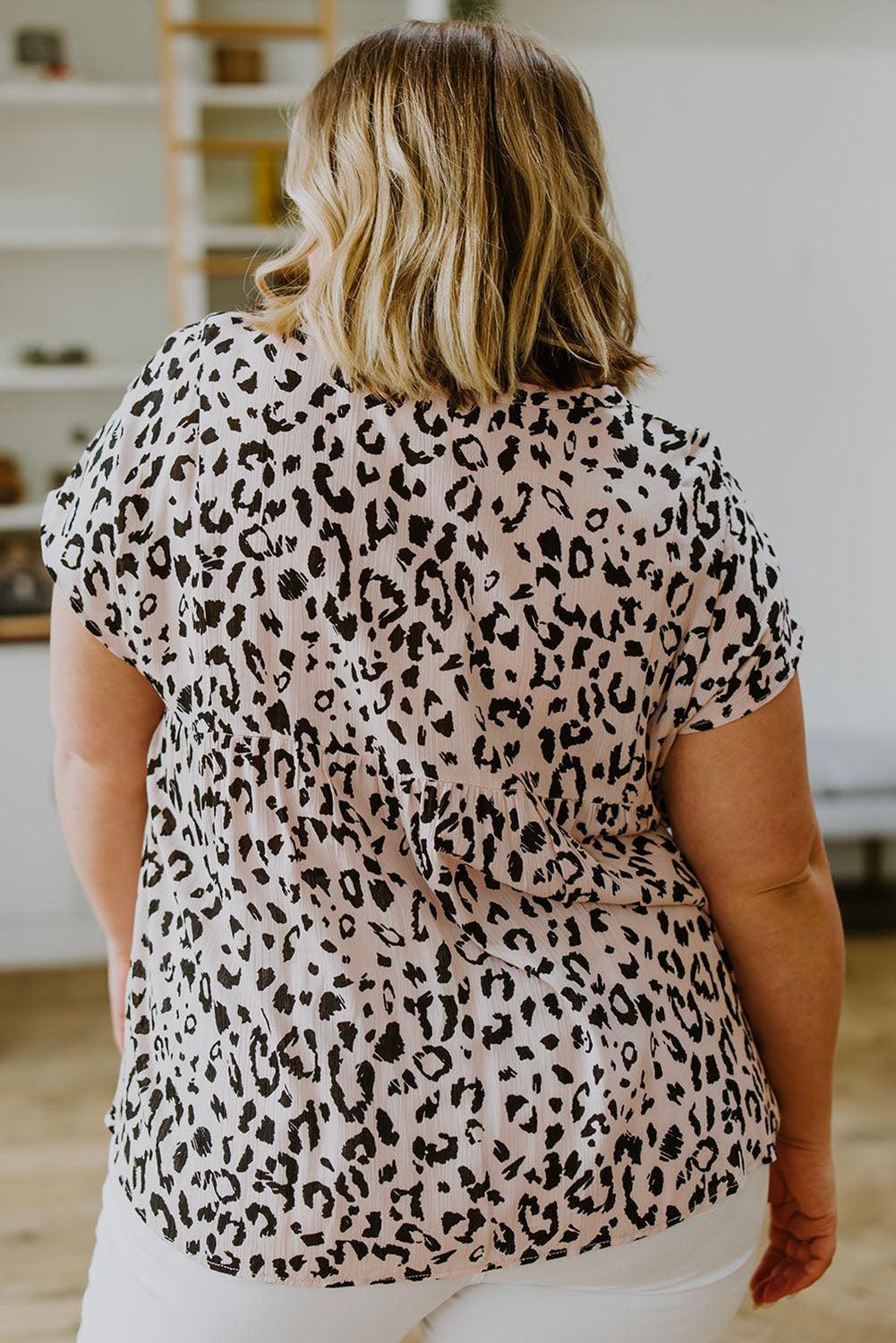 This plus-size blouse features a unique boho leopard print and classic tassel details. The lightweight shift silhouette is perfect for the office while the patchwork adds a touch of style. Perfect for everyday wear.