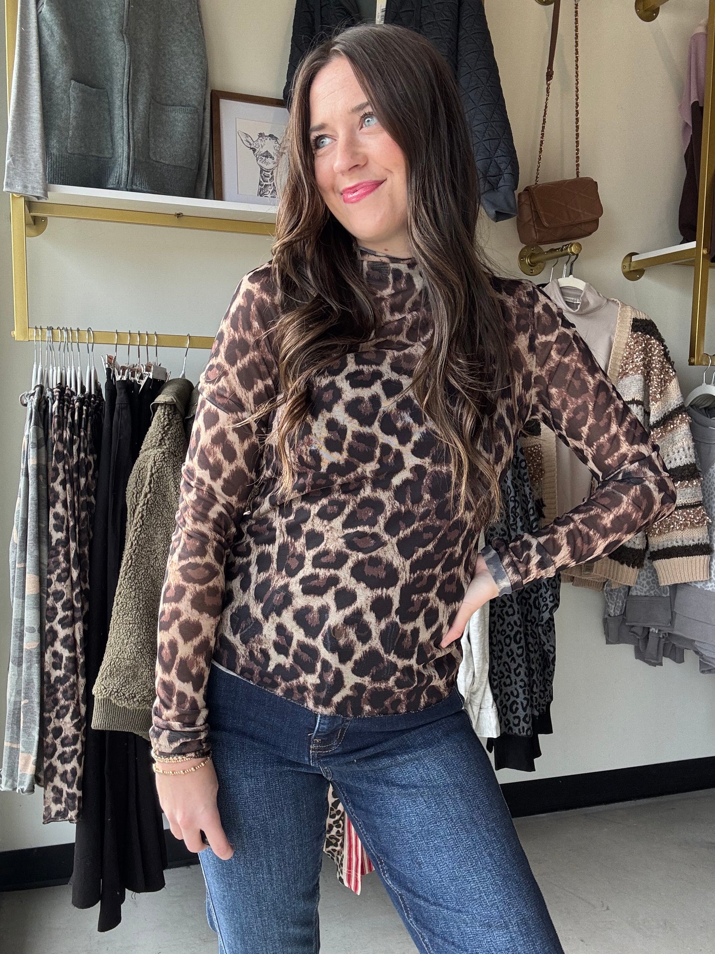 Unleash your wild side with this Leopard Ruffle Trim Mesh Top! Featuring a sheer mesh fabric with bold leopard print and playful ruffle detailing along the sleeves and hem, this long-sleeved top adds a flirty edge to any outfit. Perfect for layering or wearing solo, it brings effortless style and a touch of fierce fun to your wardrobe.
Bibi