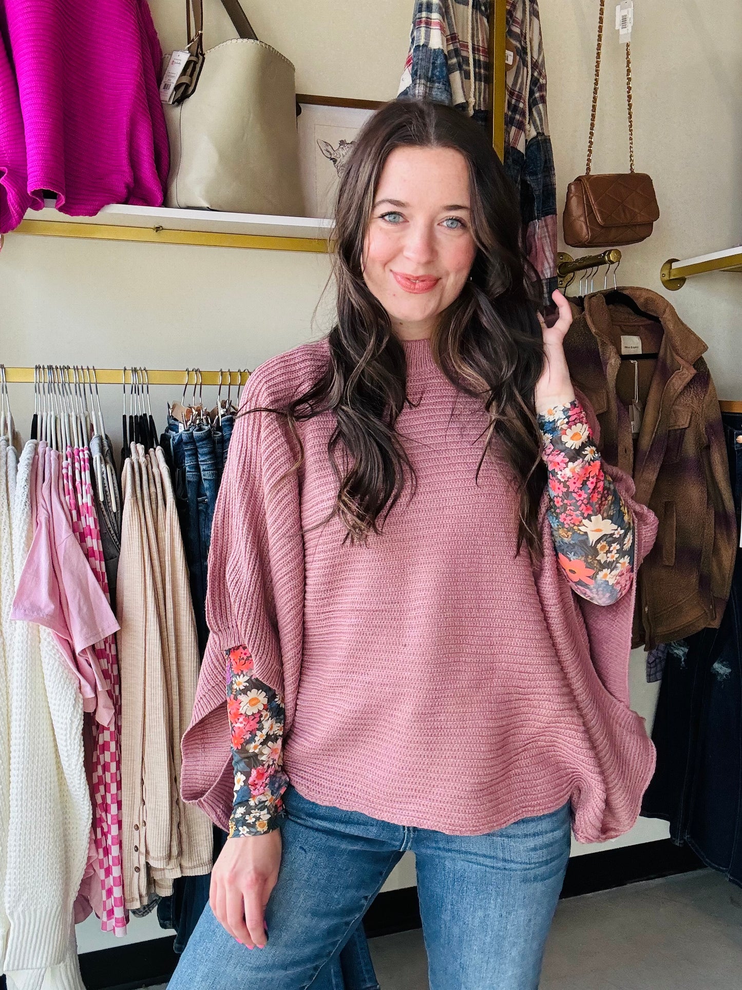 Stay warm and fashionable in this MEG Pullover Poncho. Features long arm holes for a flowy poncho feel, yet in a cute knit sweater. This stylish poncho sweater is designed to keep even the chilliest weather at bay. Perfect for a chic, cozy look.
Featured with our Dress It Up sheer tops 