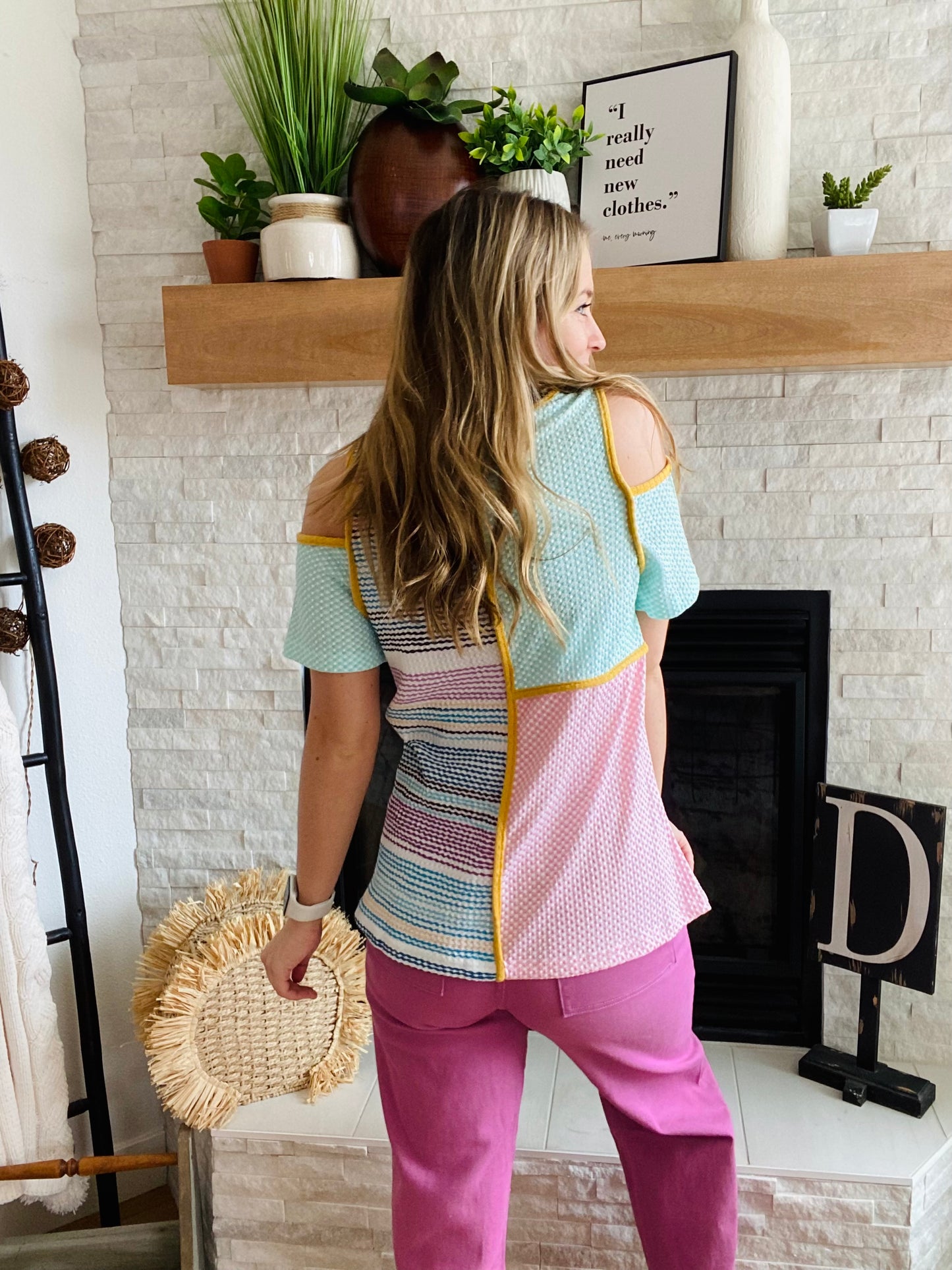 This Multi Contrast Cold Shoulder Short Sleeve blouse adds a vibrant touch to any wardrobe. In teal, pink, yellow, and purple shades, this top features a cold shoulder accent and reversed hemline for a unique look. It is true to size, ensuring a comfortable fit.