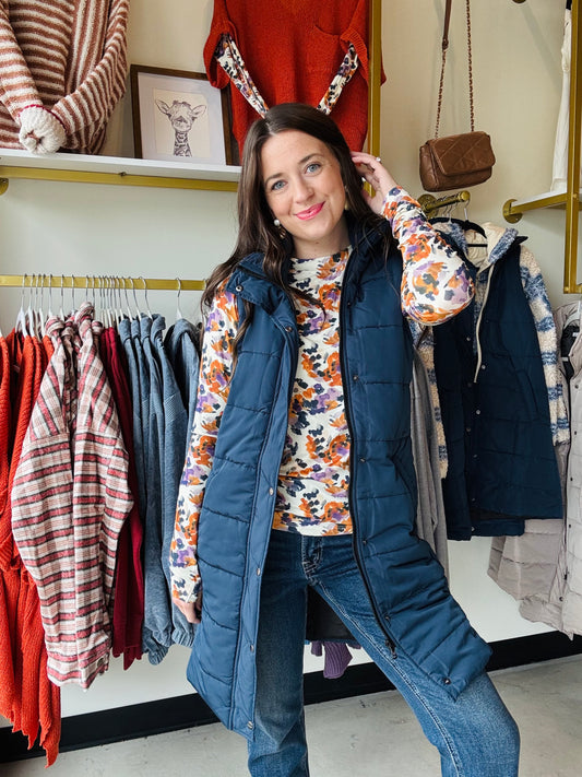 Introducing the Harlow Long Vest in Navy! With its convenient pockets, zipper and button closure and versatile pairing options with our Leah or Larissa tops, this vest is a must-have for any wardrobe. Get ready to fall in love and complete your fall and winter looks! 
Fabric: 100% Polyester
Fit: Runs true to size