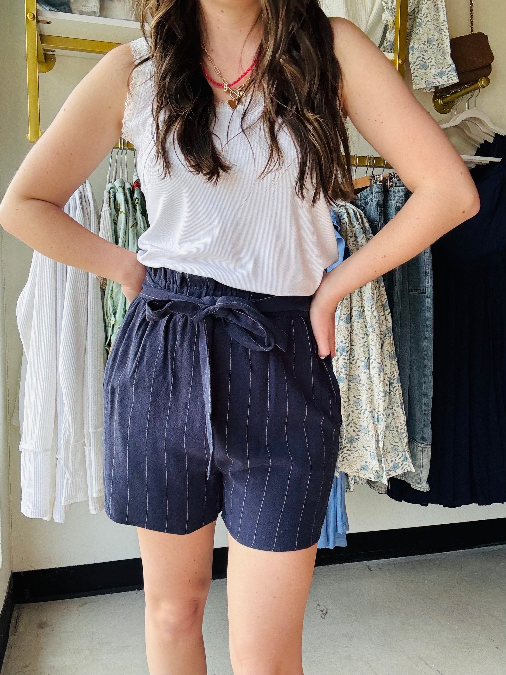 Michelle Mae
Stay cool and stylish this summer with our Libby Linen Shorts. Made from breathable linen, with a stretchy waistband and attached tie belt for a comfortable fit. Plus, pockets for added convenience. Perfect for any summer adventure.