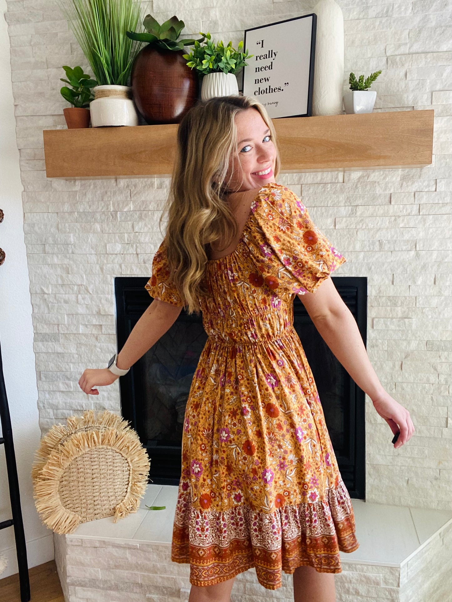 Add a pop of color to your wardrobe with this Orange Love Puffy Sleeve Dress! This statement dress features a square neckline and short puff sleeves for a modern bohemian-style look. The bright orange and red color palette adds a bold touch for any occasion.