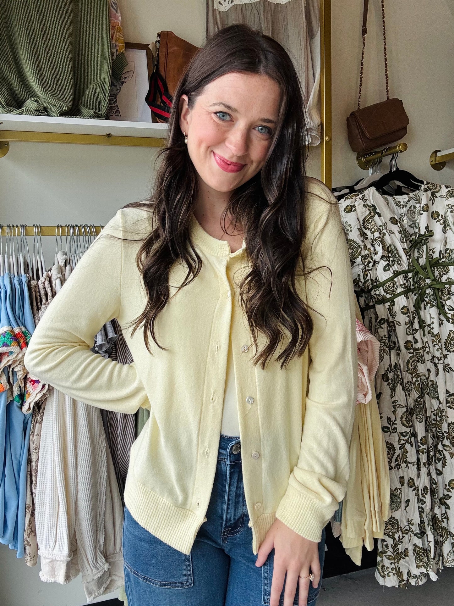 Experience comfort and style with this pastel yellow sweater cardigan, crafted from buttery soft material for a gentle touch against your skin. Featuring fully functioning front buttons, it offers versatile wear options, while ribbed cuff details add subtle texture and a refined finish. The beautiful pastel yellow hue brings a fresh, elegant pop of color to any wardrobe, perfect for layering in cooler weather.