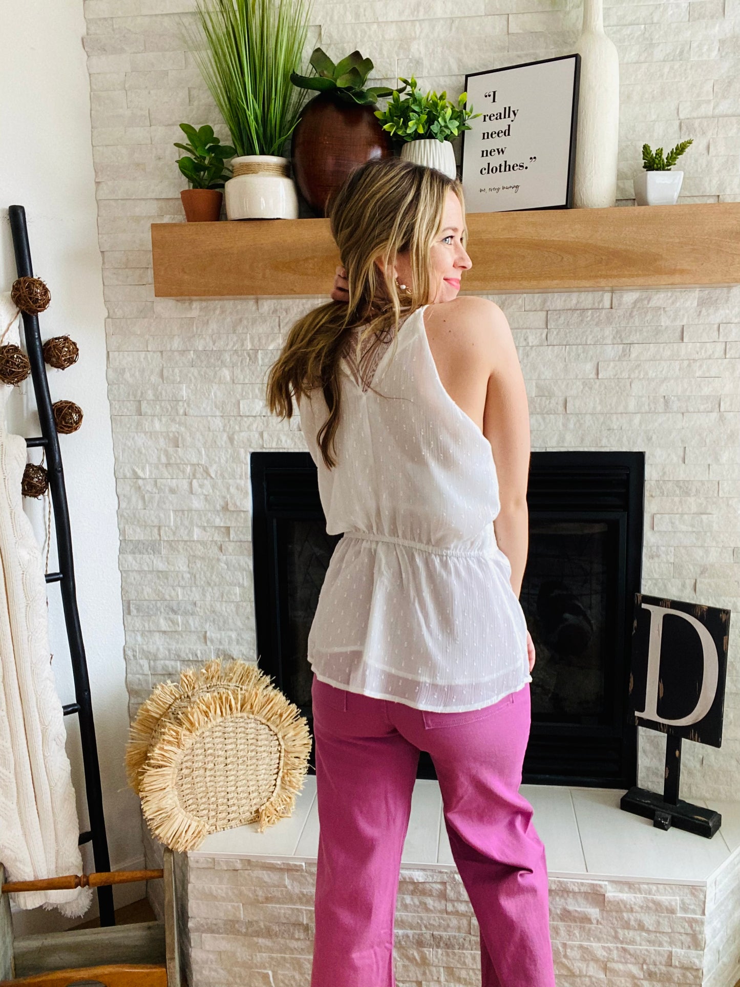 Look cute and feel comfy in this lightweight and flattering wrap tank top! The classic swiss dot pattern is a timeless and elegant touch, while the keyhole neckline and wrap waist provide just the right amount of shape. Perfect for warm days that scream for a tank top style. Enjoy!