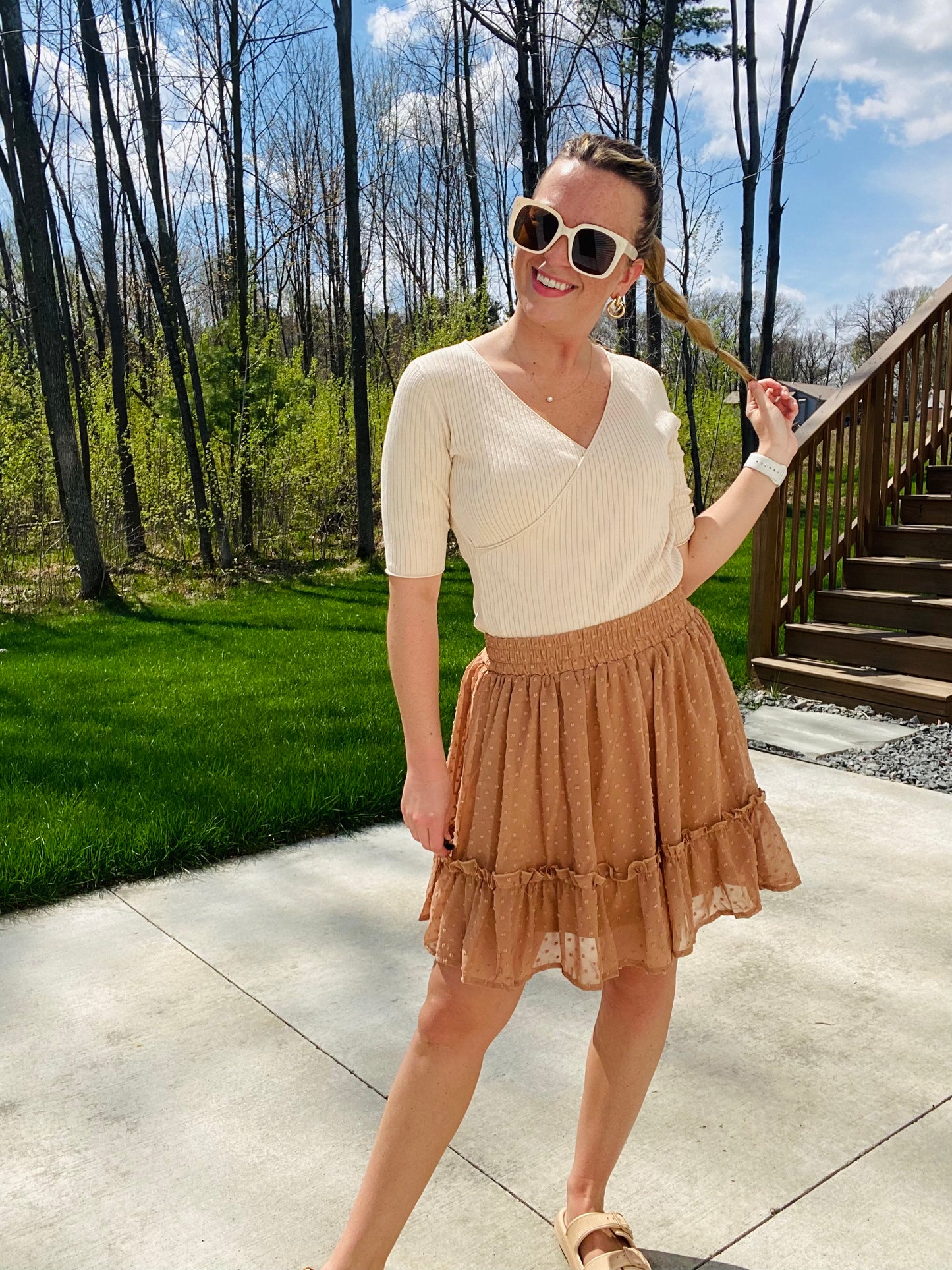 Stay on trend with this classic Khaki Swiss Dot Skirt. Crafted from lined fabric, this skirt features a comfortable elastic waistband for a secure fit. Perfect for the office or school, you'll be sure to make a chic impression. 100% Polyester
