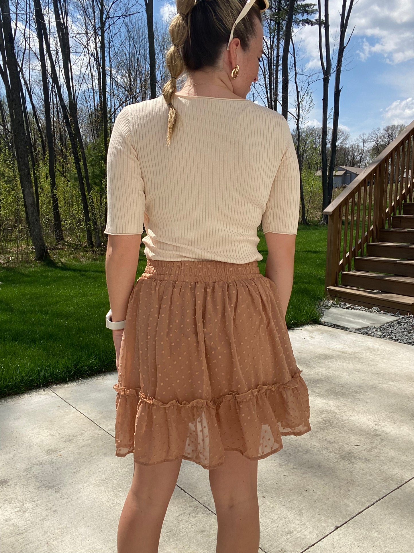 Stay on trend with this classic Khaki Swiss Dot Skirt. Crafted from lined fabric, this skirt features a comfortable elastic waistband for a secure fit. Perfect for the office or school, you'll be sure to make a chic impression. 100% Polyester
