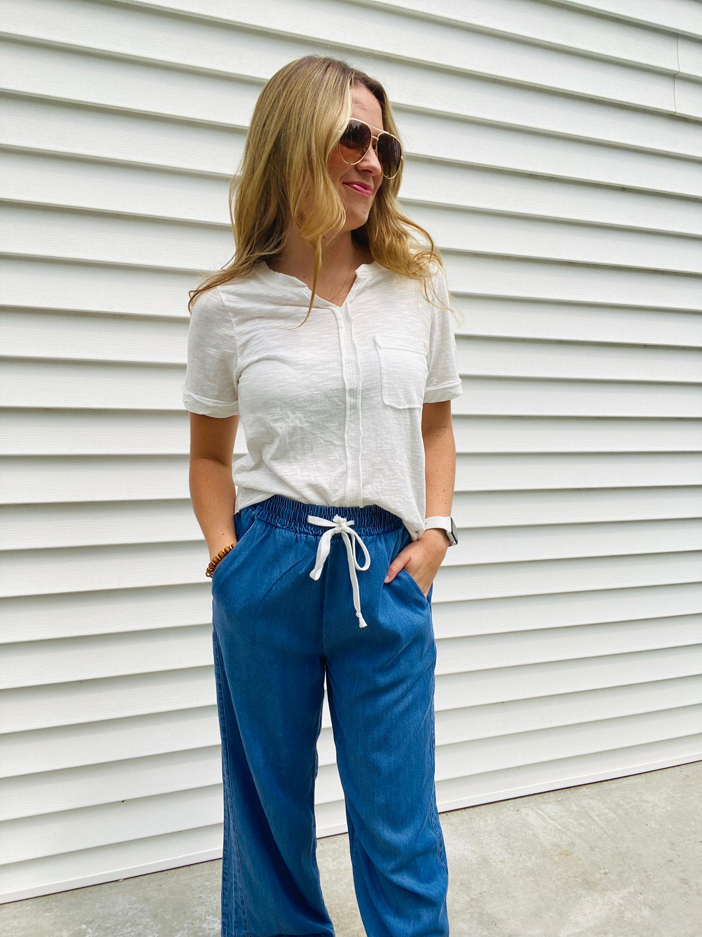 This White V Neck Jersey Knit Tee is perfect for any casual occasion. It is made of breathable jersey knit fabric for comfort, and the raw cut edge finishing provides a sleek, contemporary look. Plus, the chest pocket and exposed center seams add to its classic style. An ideal combination of comfort and style.