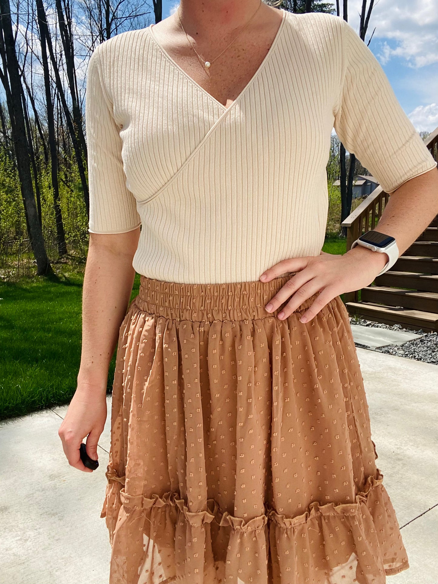 Stay on trend with this classic Khaki Swiss Dot Skirt. Crafted from lined fabric, this skirt features a comfortable elastic waistband for a secure fit. Perfect for the office or school, you'll be sure to make a chic impression. 100% Polyester