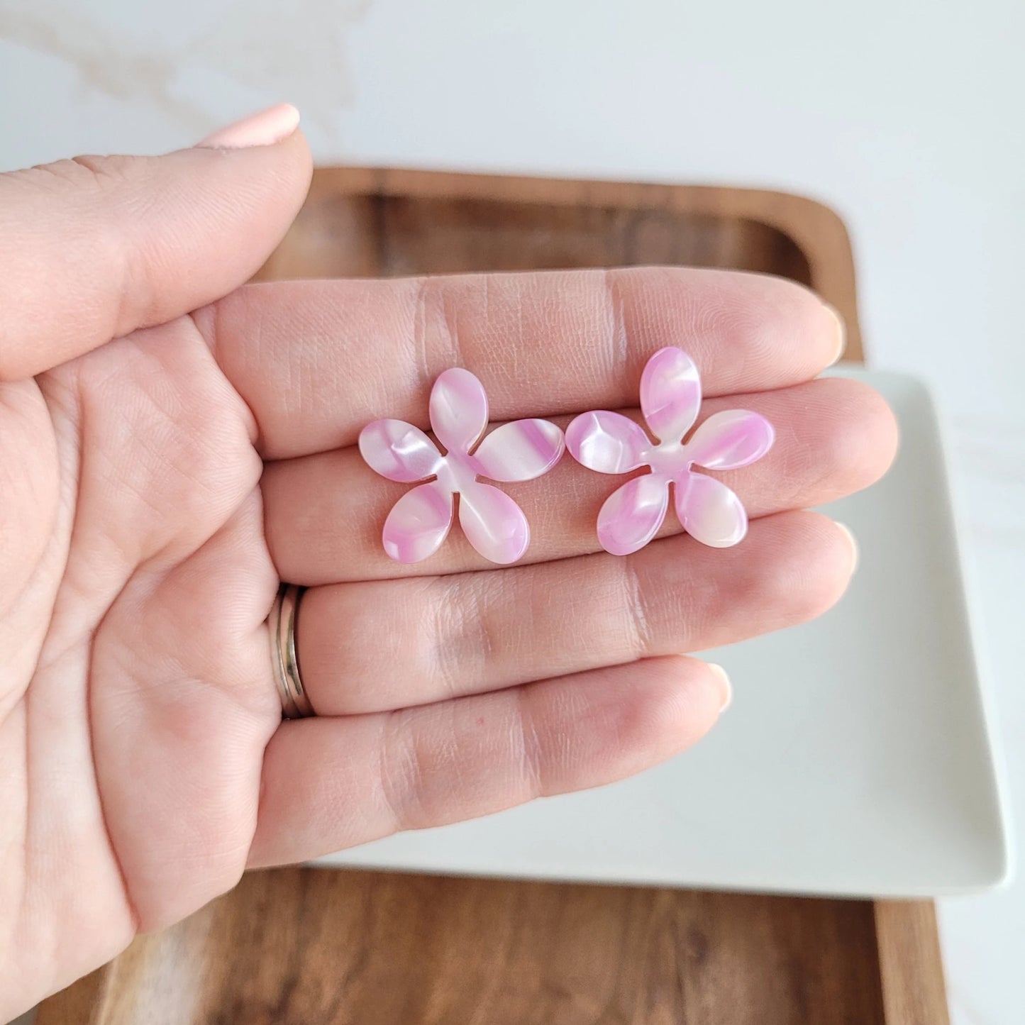 These adorable Blossom Studs will add a pop of personality to your outfit! They're the perfect accessory to brighten up your favorite outfit.