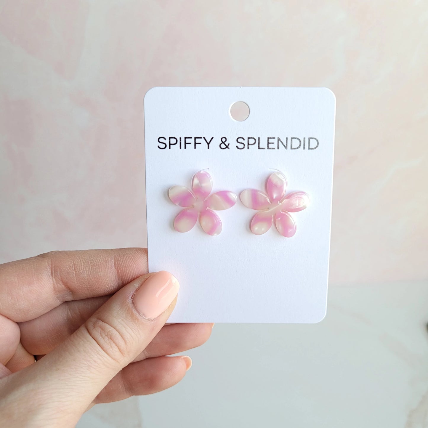 These adorable Blossom Studs will add a pop of personality to your outfit! They're the perfect accessory to brighten up your favorite outfit.