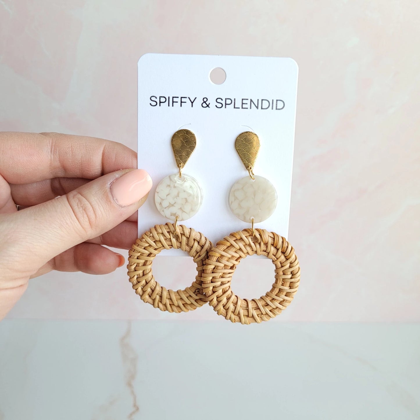 Bring a little bit of resort wear glam to your everyday style with these lightweight, rattan earrings. We've hooked you up with the perfect statement earrings with a trendy twist on our classic rattan look. The gold accents and acrylic only add to their luxurious feel and make them perfect for pairing with any outfit.
