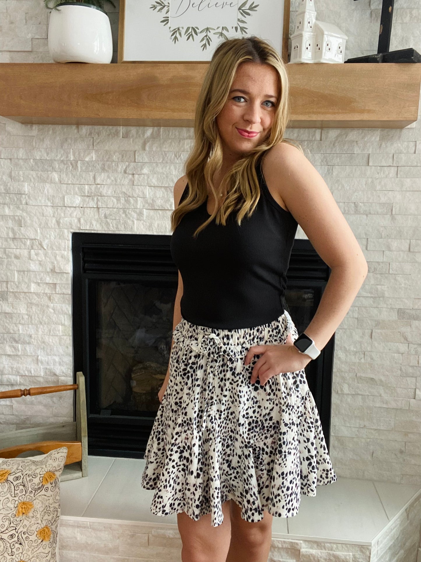 Bring the wild side to your wardrobe with this Leopard Print Mini Ruffle Skirt! From a distance, its bold black and white animal print screams "edgy and daring". But don't let that fool you - its lightweight fabric keeps you feeling breezy and comfortable, letting you break the rules at the office in style! Get ready to roar!