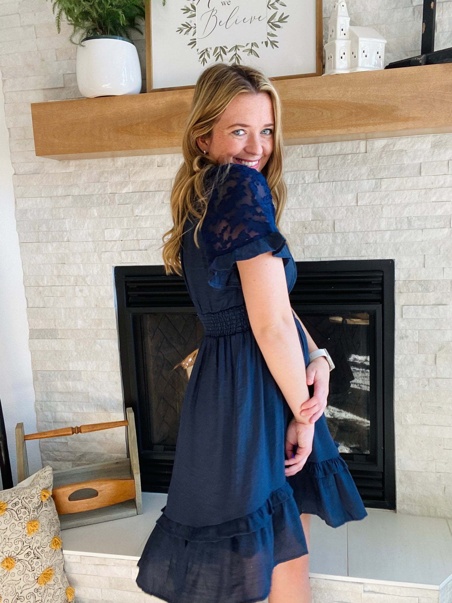 This Nacy Lace Sleeve Smocked Dress is perfect for any occasion. Crafted from high-quality fabric, this country chic style dress features a cinched smocking waistline and delicate lace sleeve detail to make you look and feel your best. Ideal for the office or a summer barn wedding.