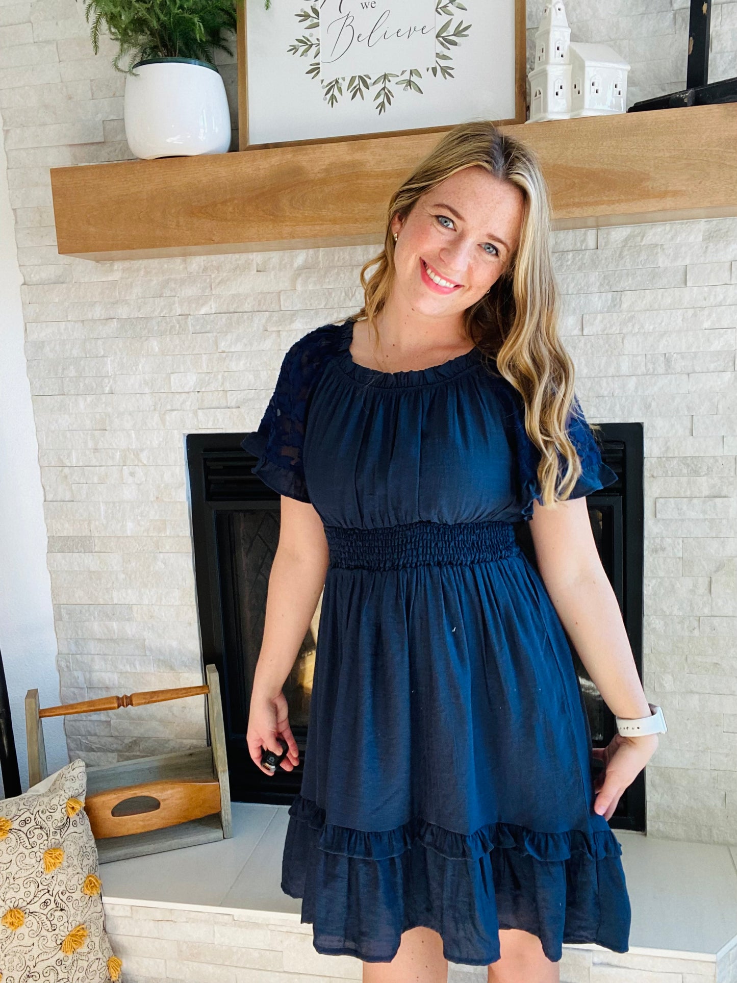 This Nacy Lace Sleeve Smocked Dress is perfect for any occasion. Crafted from high-quality fabric, this country chic style dress features a cinched smocking waistline and delicate lace sleeve detail to make you look and feel your best. Ideal for the office or a summer barn wedding.