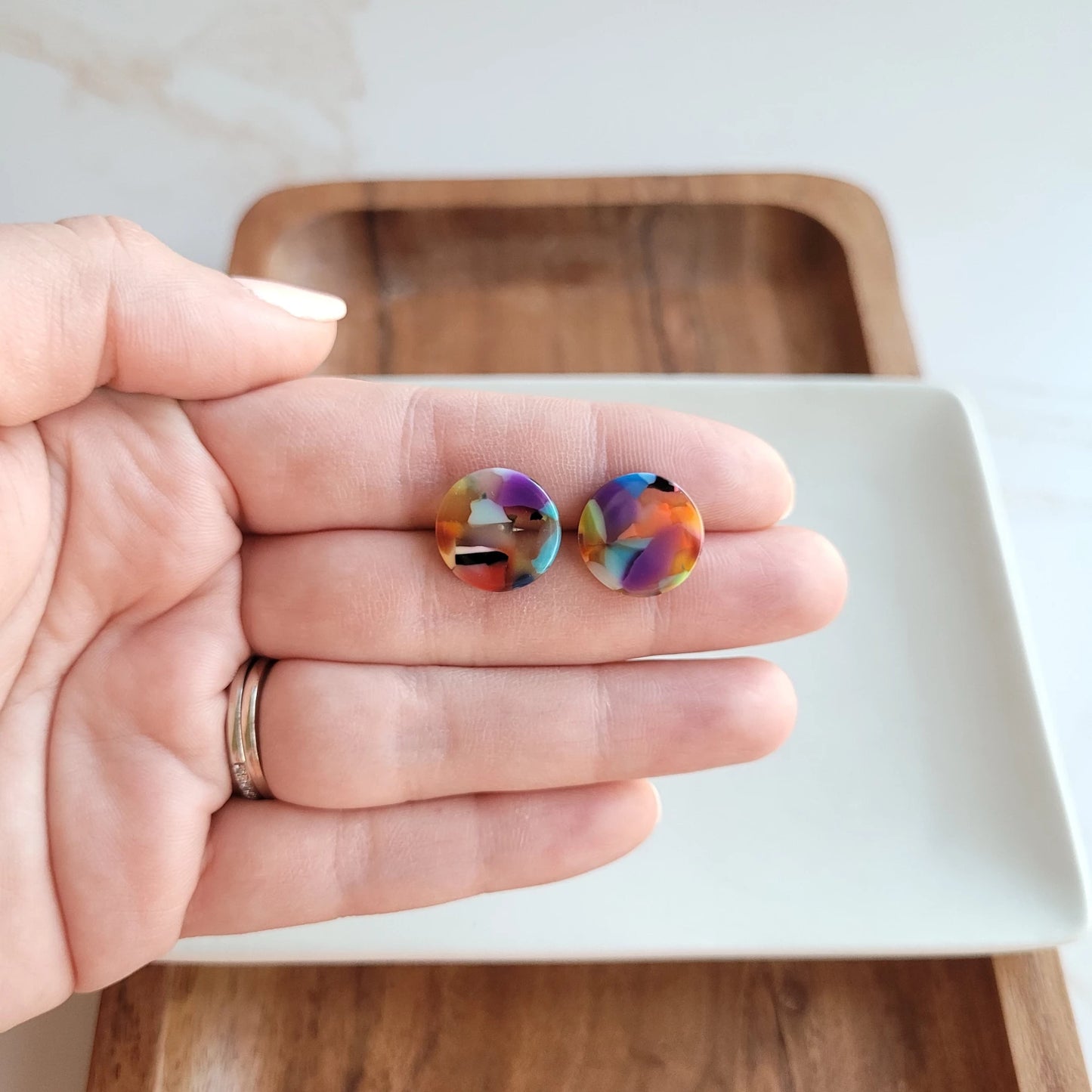 Our classic Sophie Stud Earrings are circle-shaped studs that come in a variety of colors. These earrings are perfect for everyday wear, and the simple design makes them versatile enough to pair with any outfit. These studs are made with high-quality materials, ensuring they will be a staple in your jewelry collection for years to come.