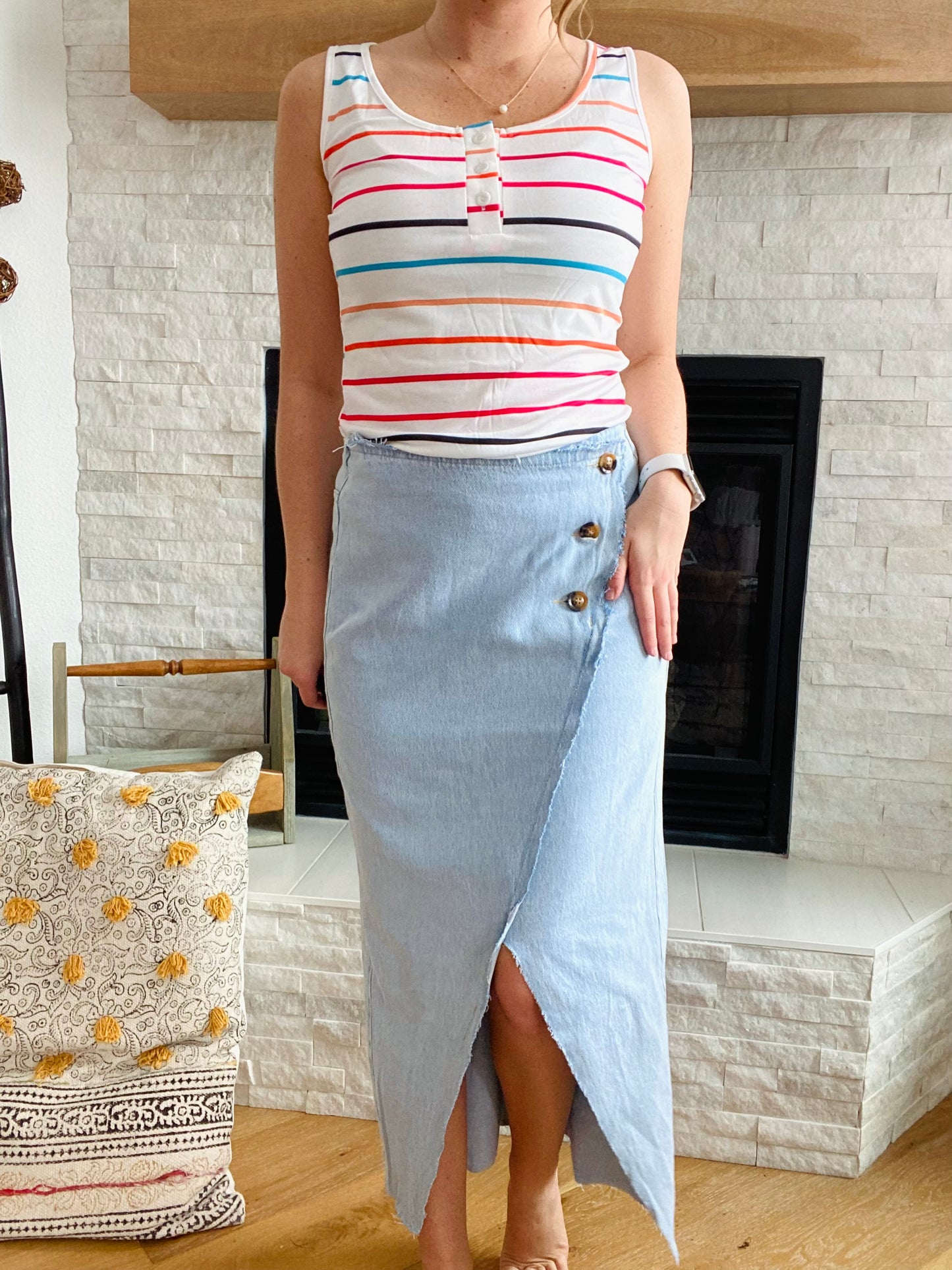 Make a stylish statement with our Sky Blue Button Wrap Denim Skirt! With functioning buttons and raw hemline, this unique denim maxi skirt will be sure to make heads turn. The slit and back pockets provide you with extra mobility, allowing you to move with ease and confidence. Dare to be different!