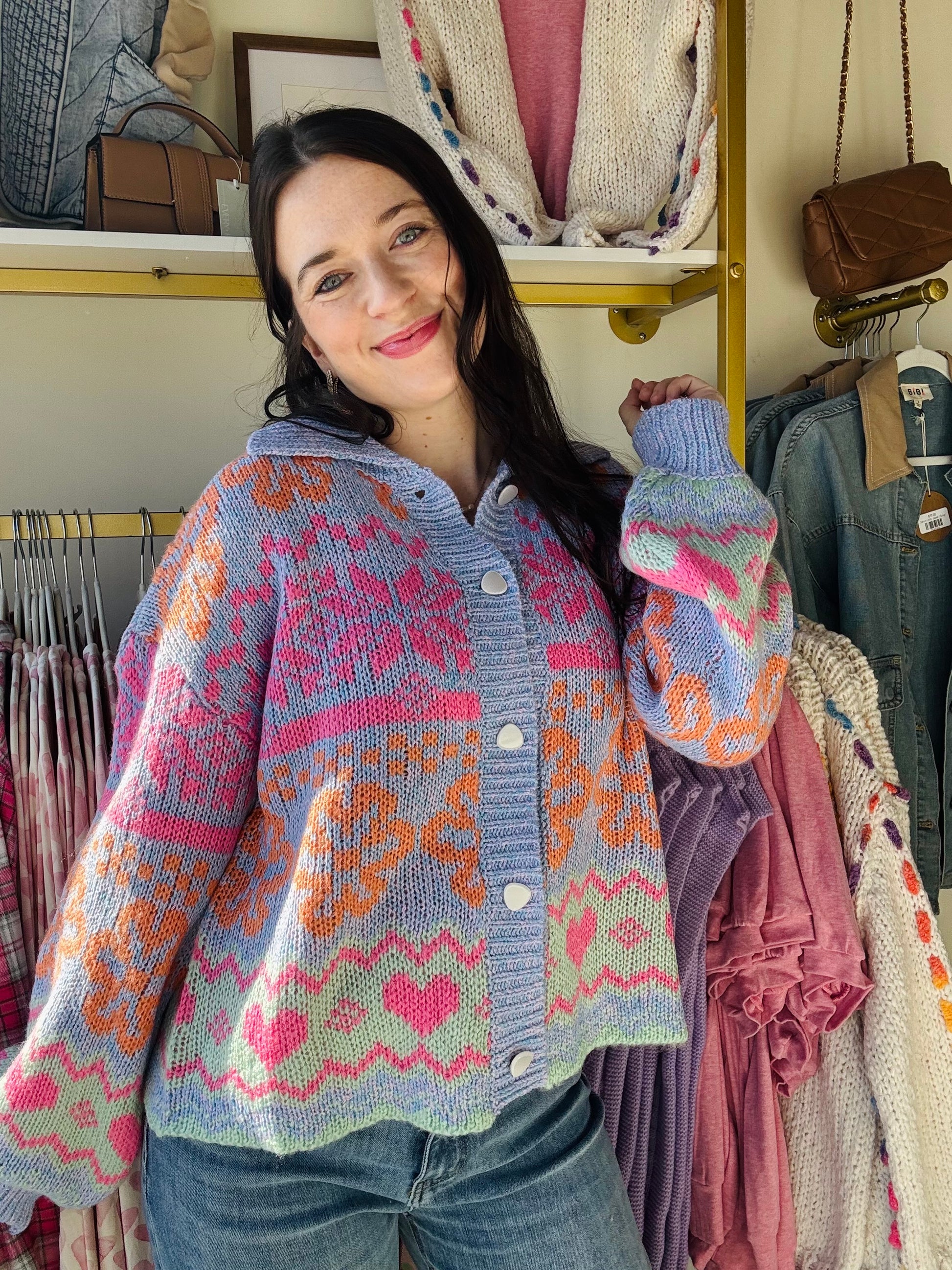 Pink, orange, green and purple button up patterned cardigan