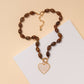 Pearlescent Heart Pendant Marbled Bead Necklace