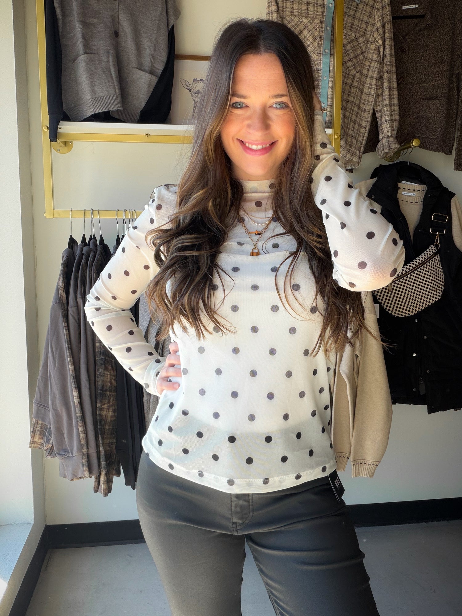Black and white polka dot long-sleeve top