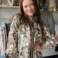 Ecru Abstract Smocked Neck Top