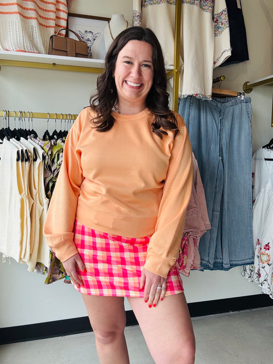 Experience ultimate luxury in this silky-soft apricot pullover featuring a figure-flattering tapered waist. This ultra-soft crewneck blends casual comfort with a chic, defined silhouette for effortless everyday style. It’s the perfect high-end staple for your capsule wardrobe.

Buttery-soft, silky-touch premium fabric.
Flattering tapered waist defines silhouette.
Vibrant apricot hue brightens looks.
Classic crewneck for effortless layering.
Versatile style: loungewear to lunch.
Lightweight warmth for all-da