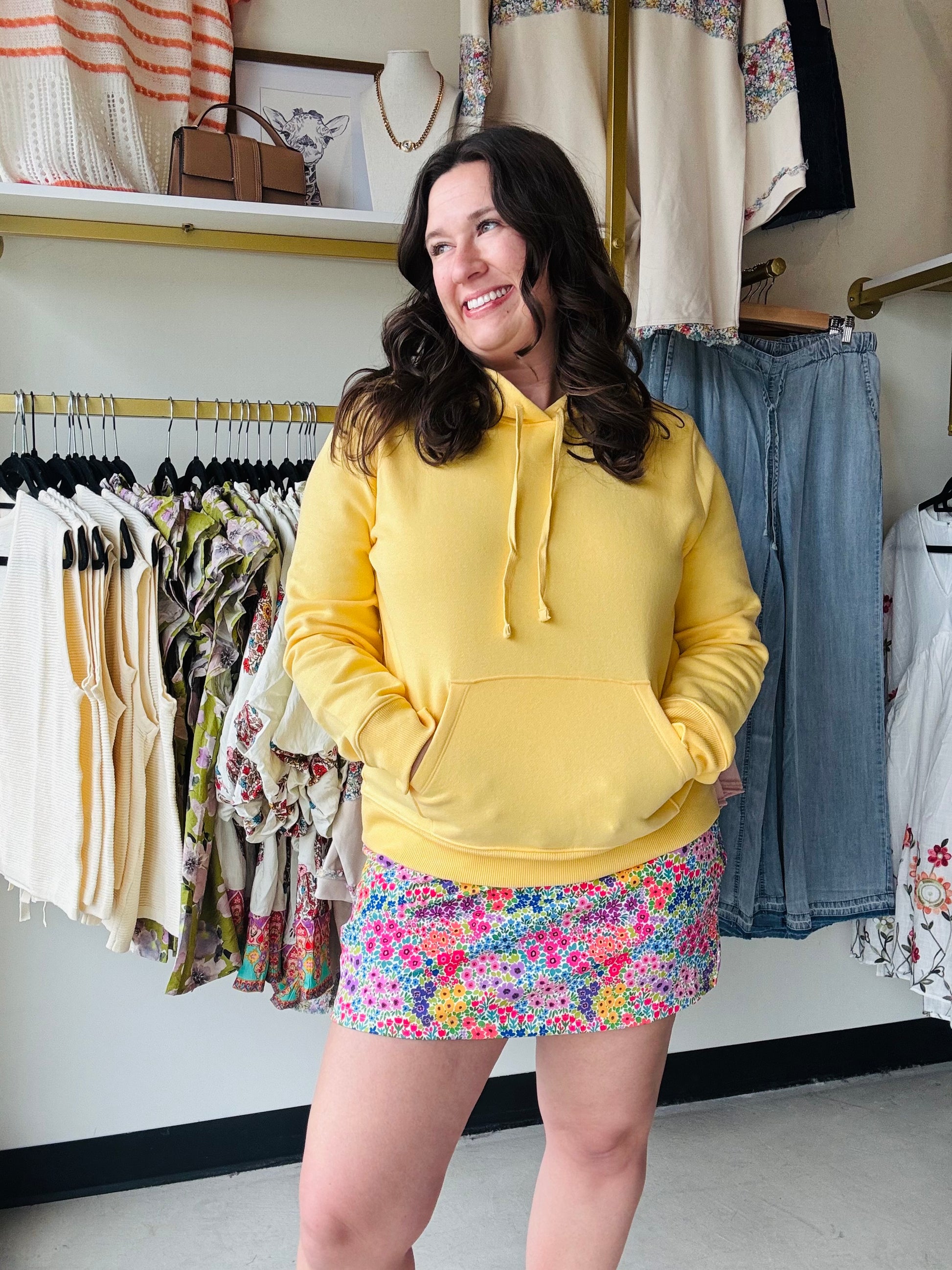 Brighten your wardrobe and your mood with this sunshine-inspired staple. Featuring a cloud-like fleece lining and a classic kangaroo pocket, it’s the ultimate blend of effortless style and premium warmth. Perfect for layering on chilly mornings or lounging in total comfort.